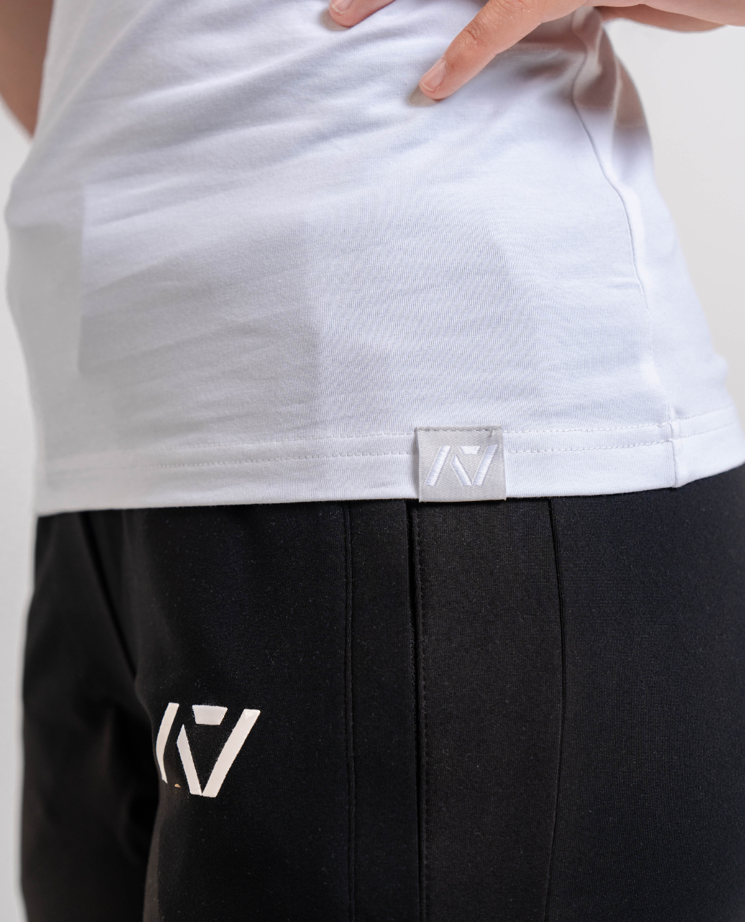 Bottom Hem Tag with A7 Logo on the bottom front of the meet shirt