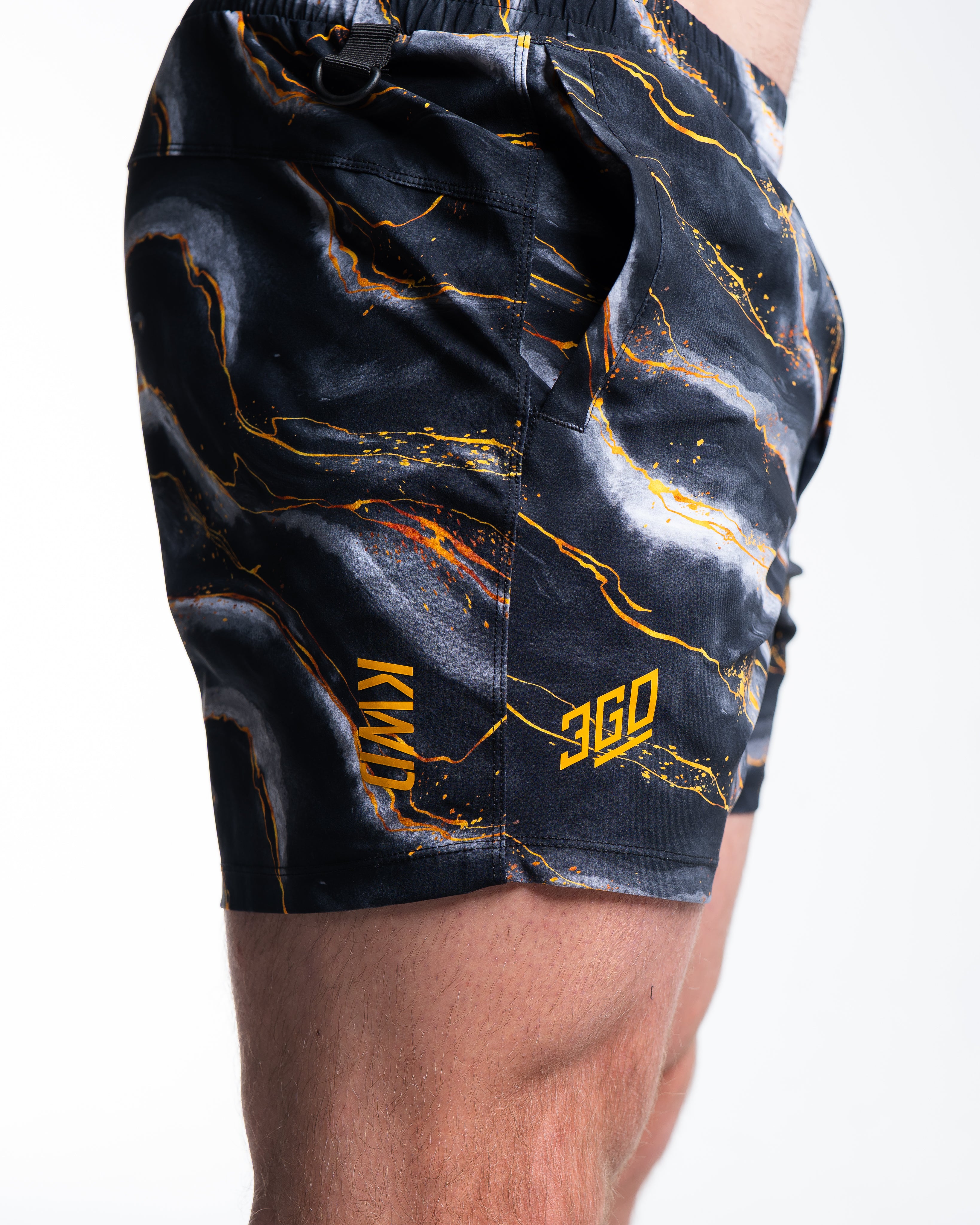 Side view of 360Go 1Z KWD Shorts – Aurum showing KWD length and mattee silicone logos.