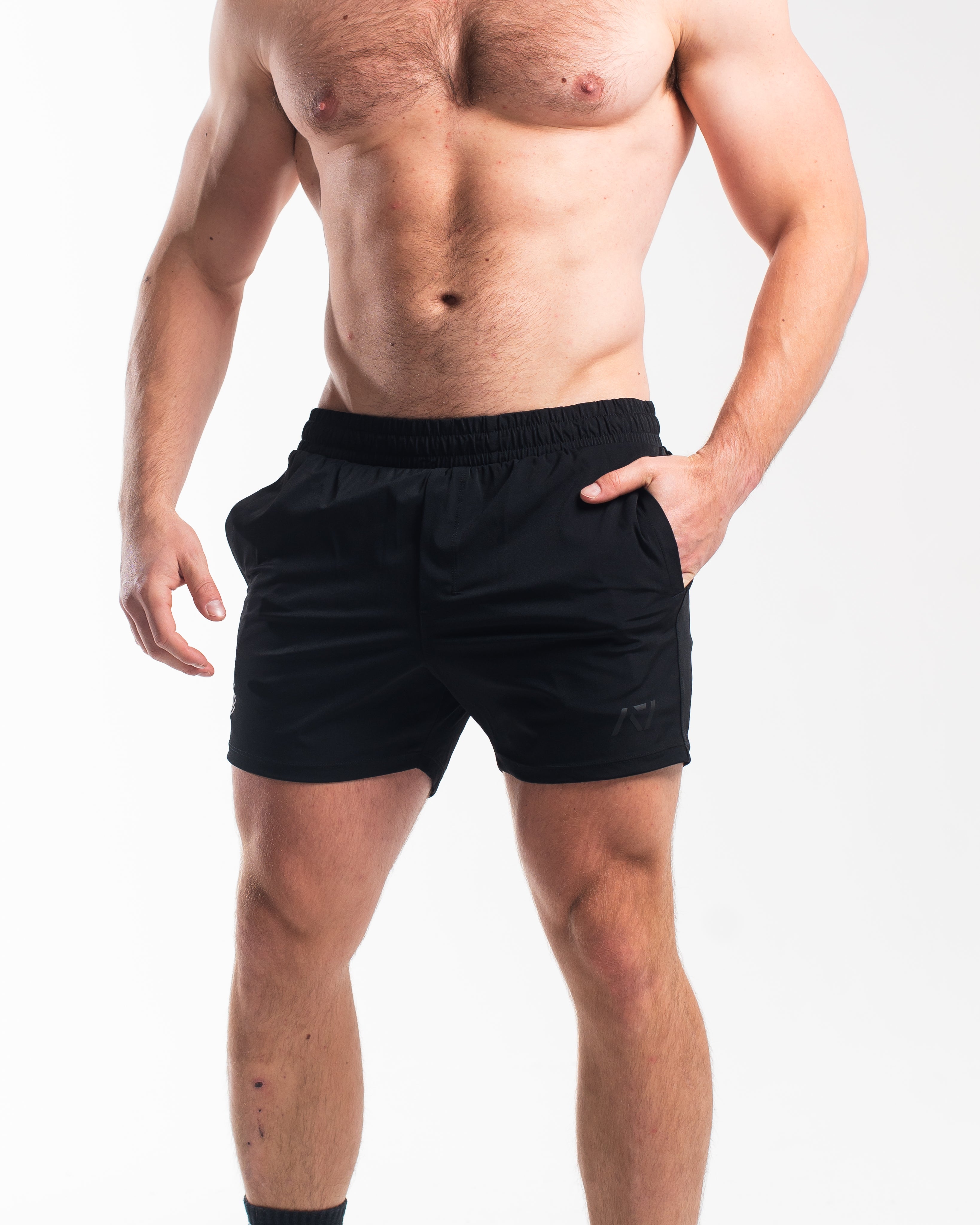 Front view of A7 360Go 1Z KWD Shorts in Stealth, showcasing matte black design, built-in liner, and wide waistband.