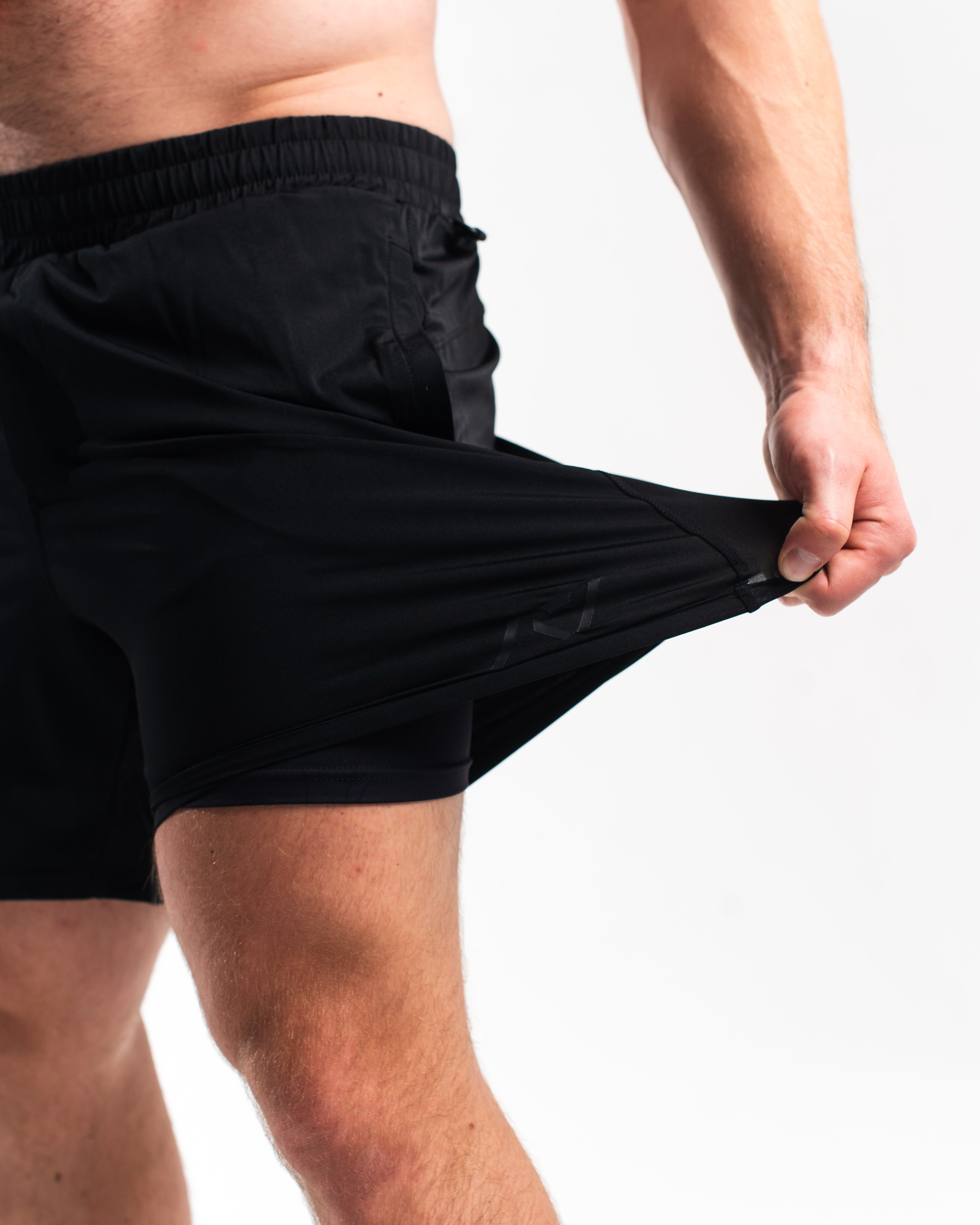 Close-up of the 360-degree stretch fabric on A7 360Go 1Z Shorts – Stealth, designed for maximum mobility during squats, deadlifts, and dynamic movements.