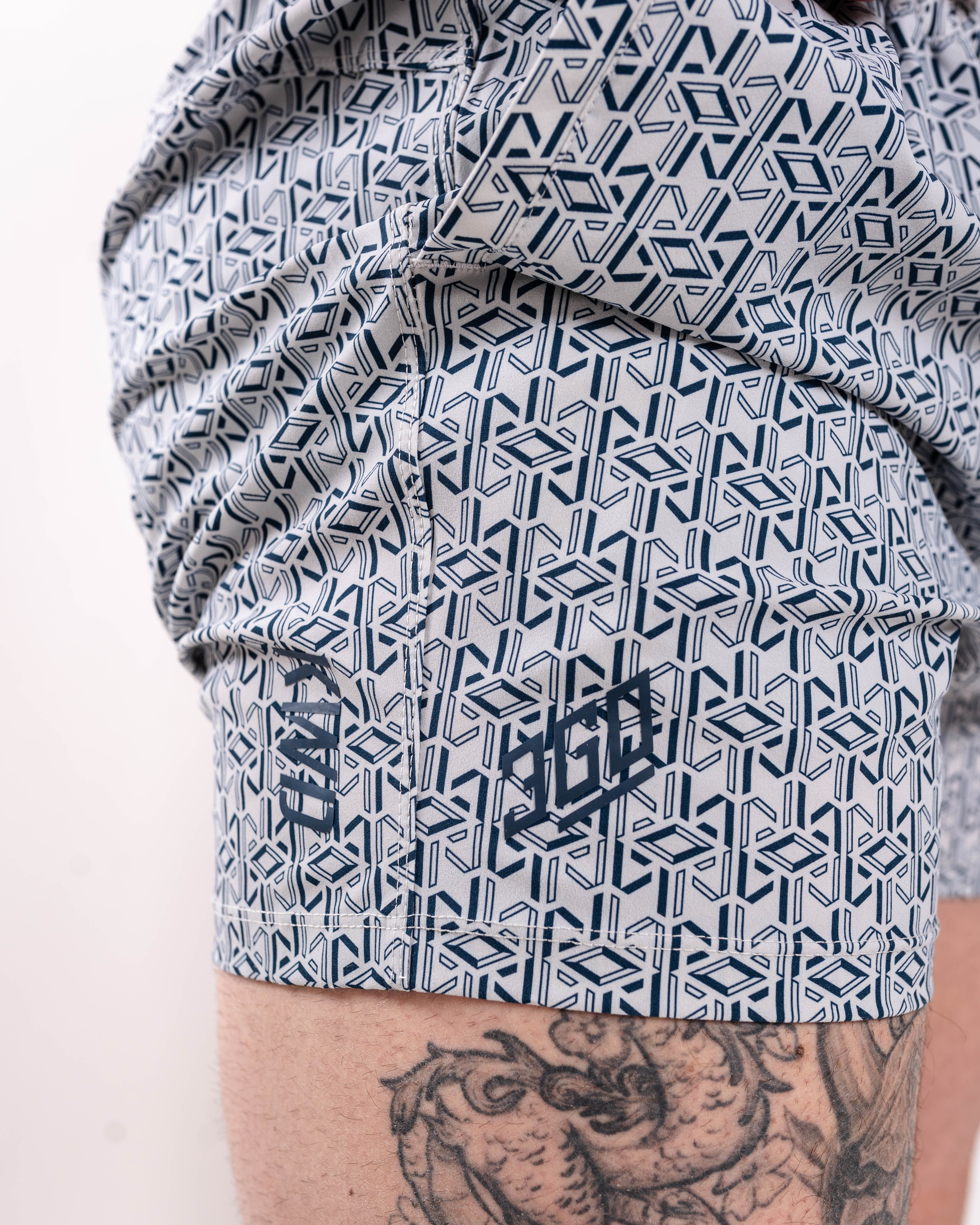 Matte silicone A7 logos on Stelacrosha Tides 360Go Shorts for subtle branding and a premium finish.