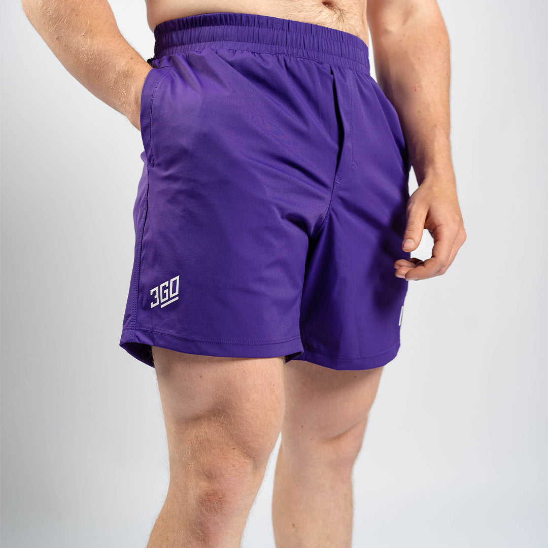 Front view of A7 360Go Shorts in Purple, Regular inseam, featuring bold color, wide waistband, and clean athletic fit.