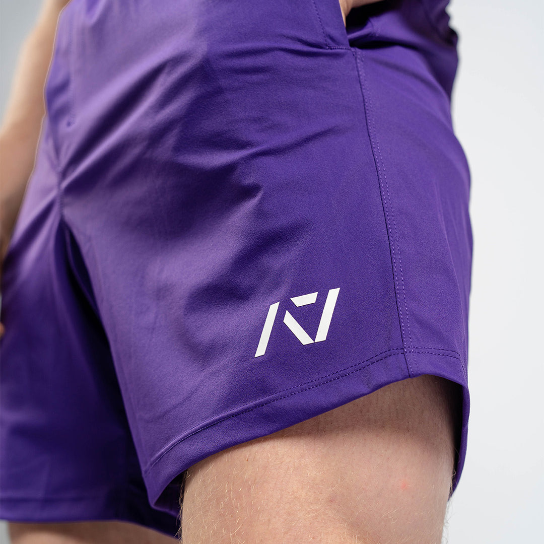 Matte silicone A7 logos on Purple 360Go Shorts offering subtle branding on a bold color base.