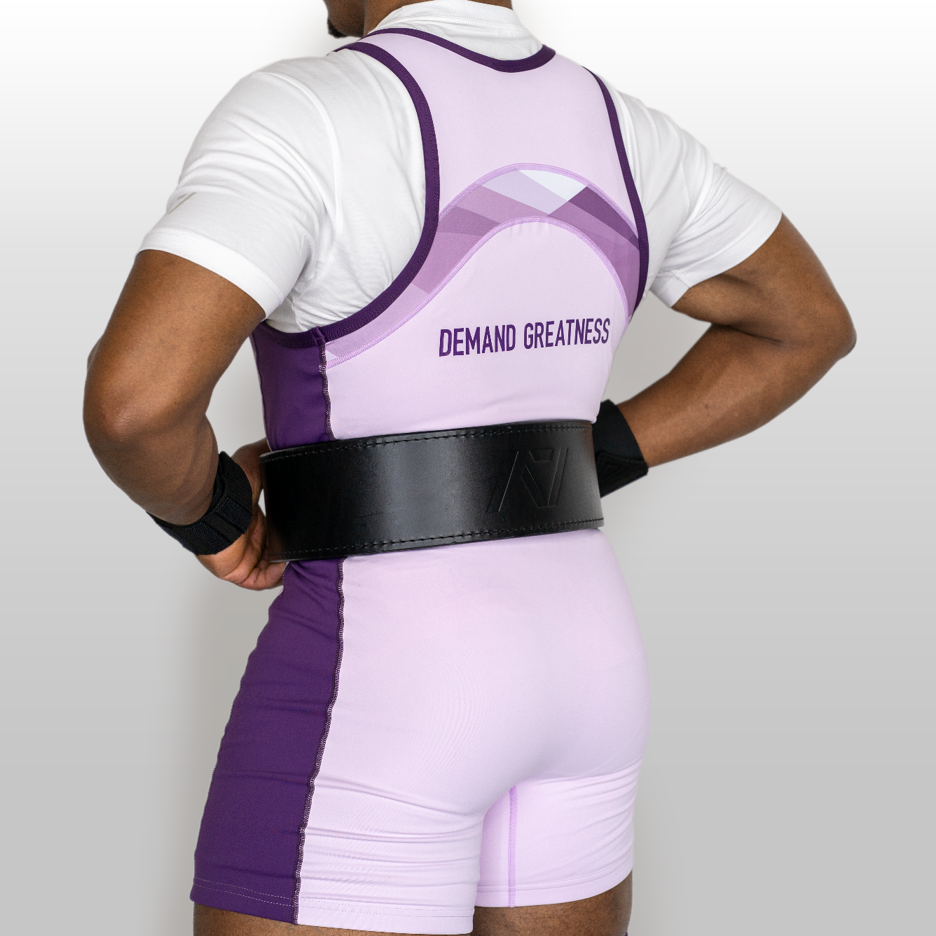 Back shot of Lavender Rausch Singlet on male model, showcasing cut and compression fit