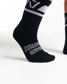 Close-up of the knit fabric on A7 Crew Socks in Black Domino, showing texture and stitching details.