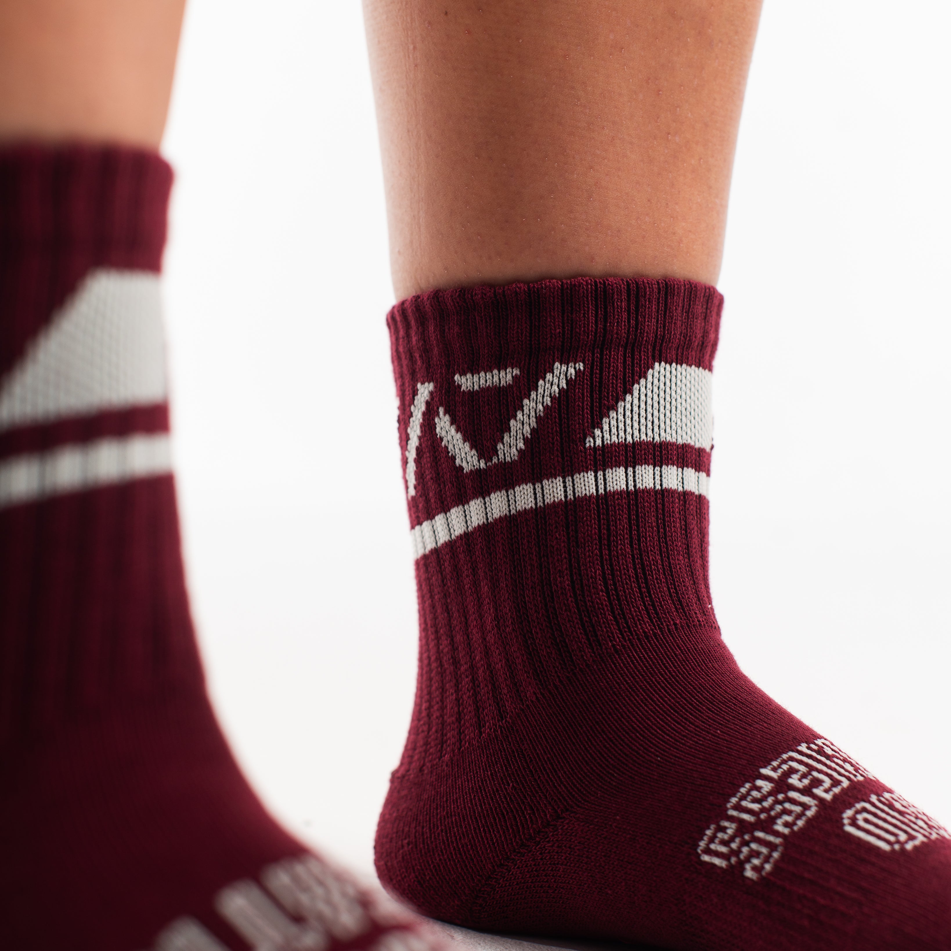 Close-up of the knit fabric on A7 Crew Socks in Ivory Rose, showing texture and stitching details.