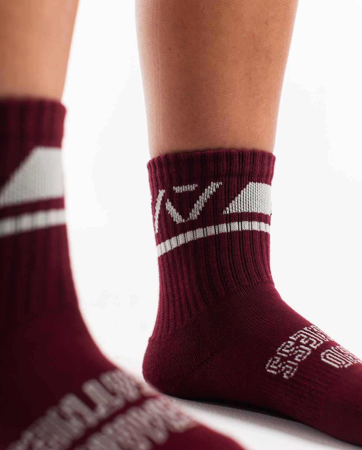Close-up of the knit fabric on A7 Crew Socks in Ivory Rose, showing texture and stitching details.
