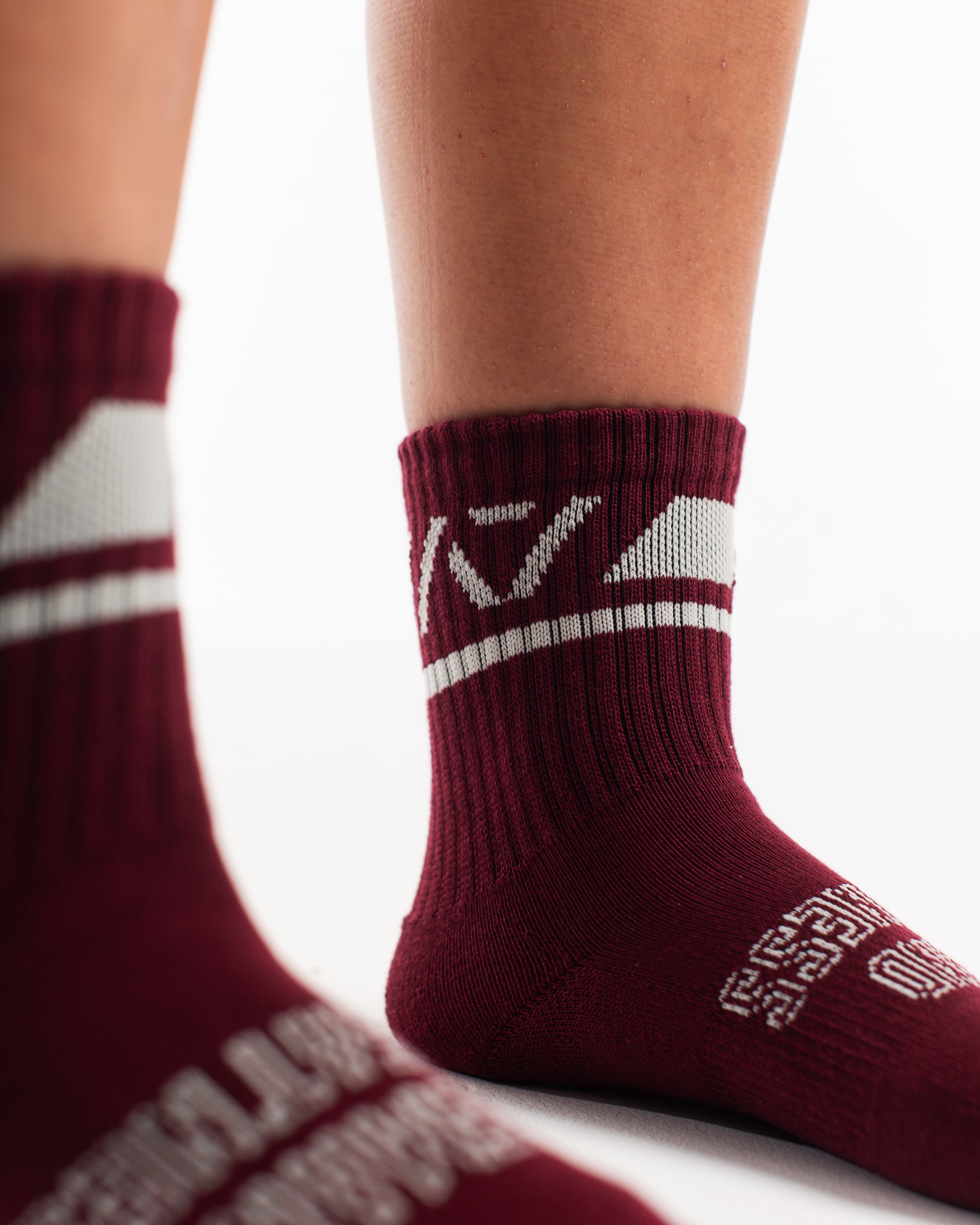 Close-up of the knit fabric on A7 Crew Socks in Ivory Rose, showing texture and stitching details.