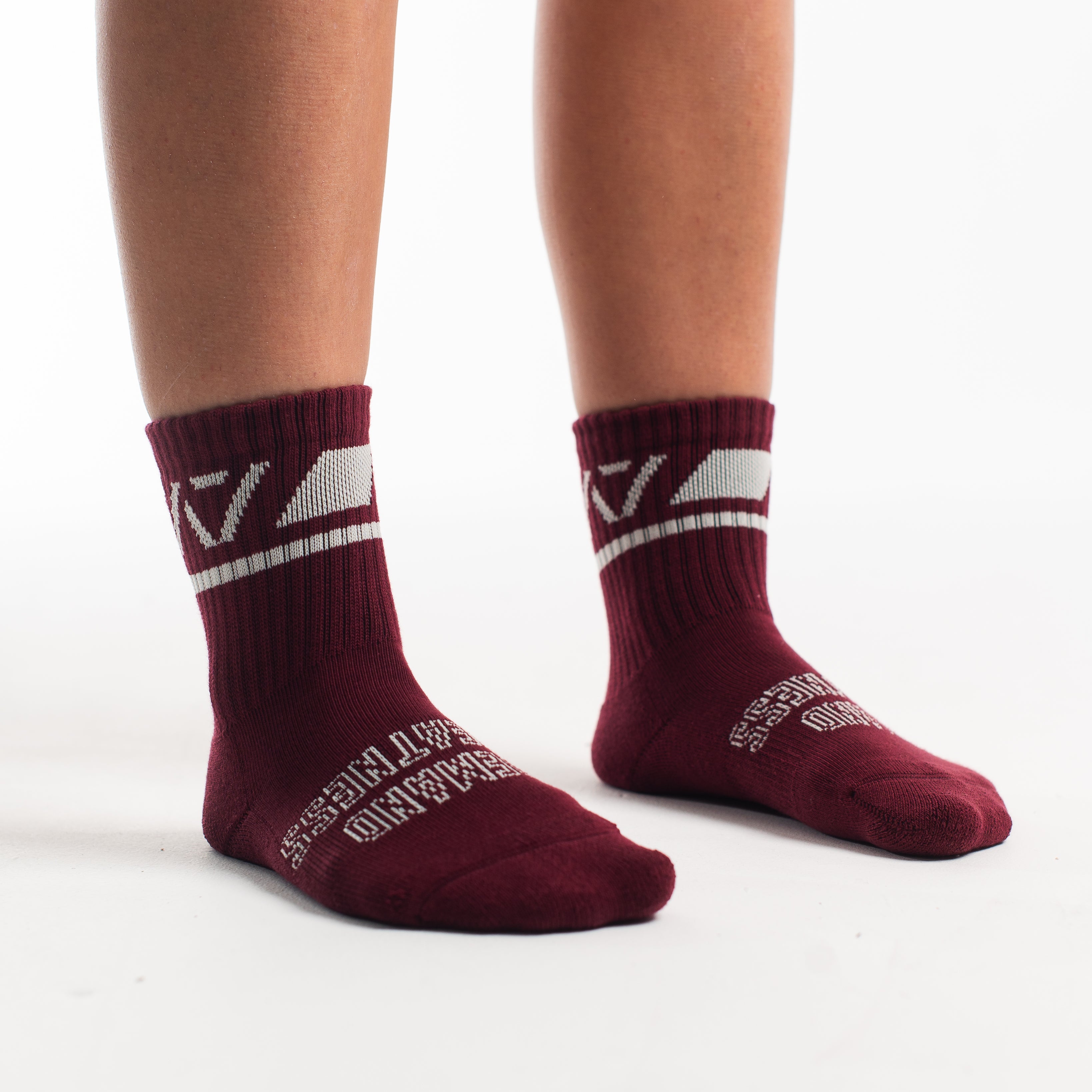 Side profile of A7 Crew Socks in Ivory Rose, highlighting the A7 logo on the ankle and compression-style top.