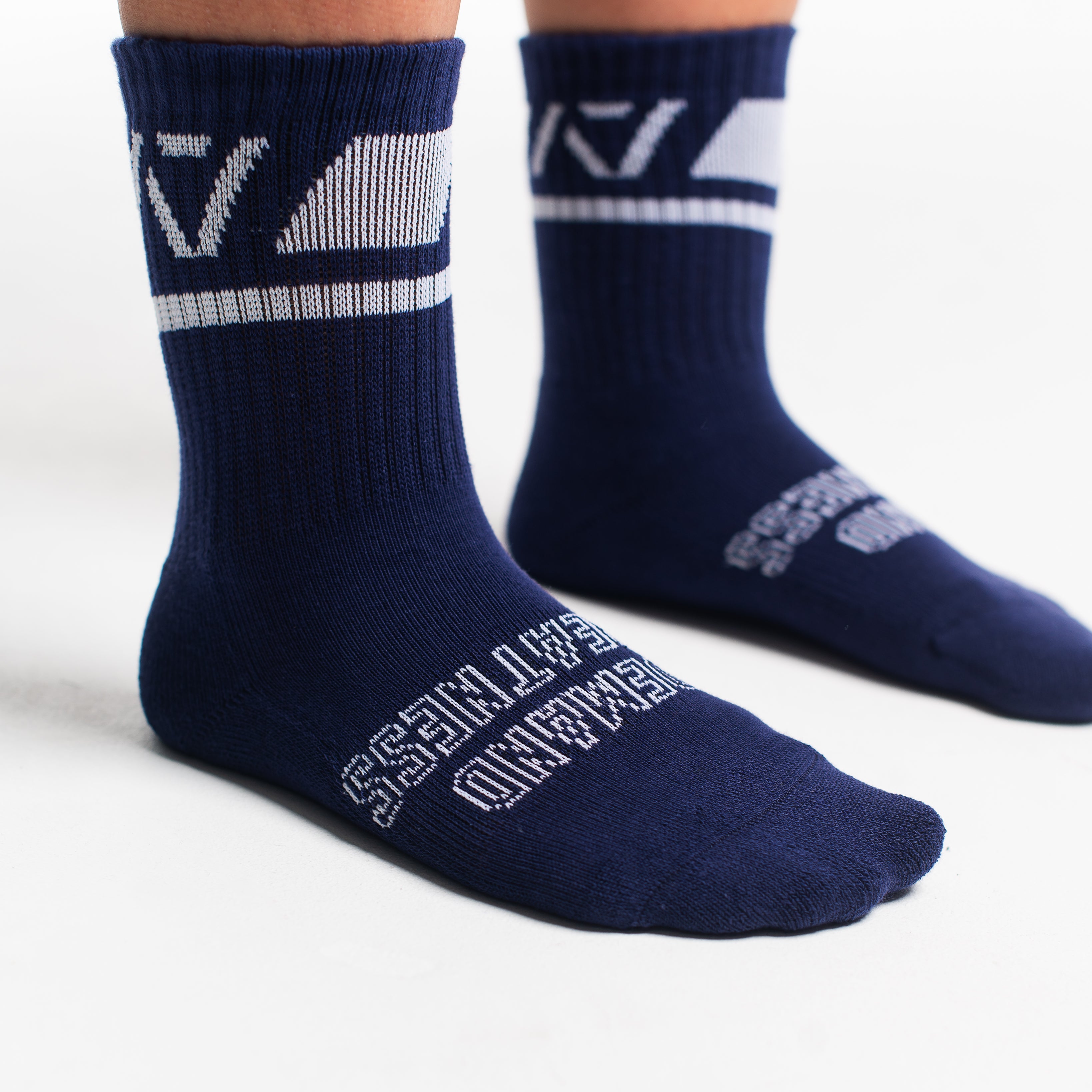 Close-up of the knit fabric on A7 Crew Socks in Night Light, showing texture and stitching details.