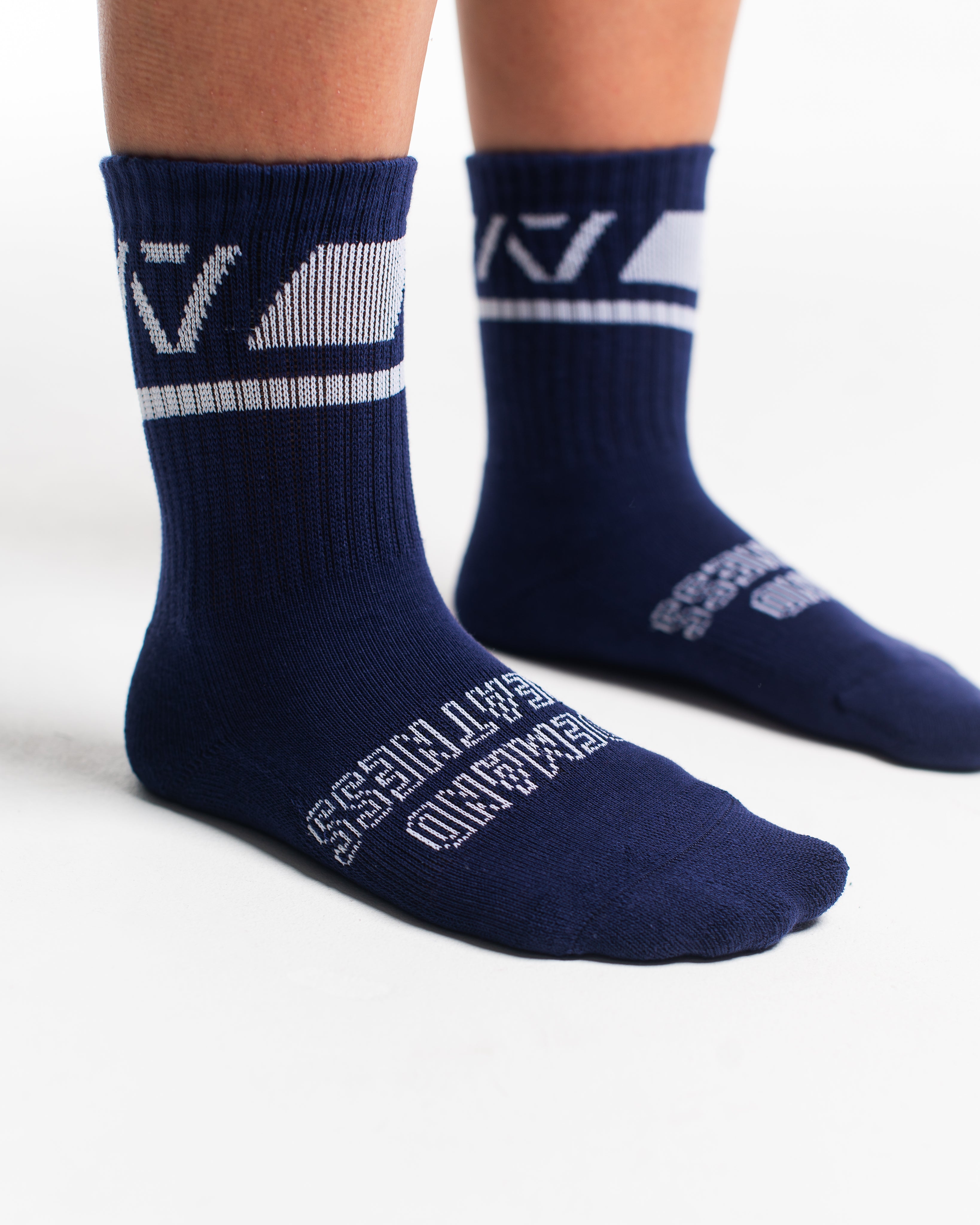 Close-up of the knit fabric on A7 Crew Socks in Night Light, showing texture and stitching details.