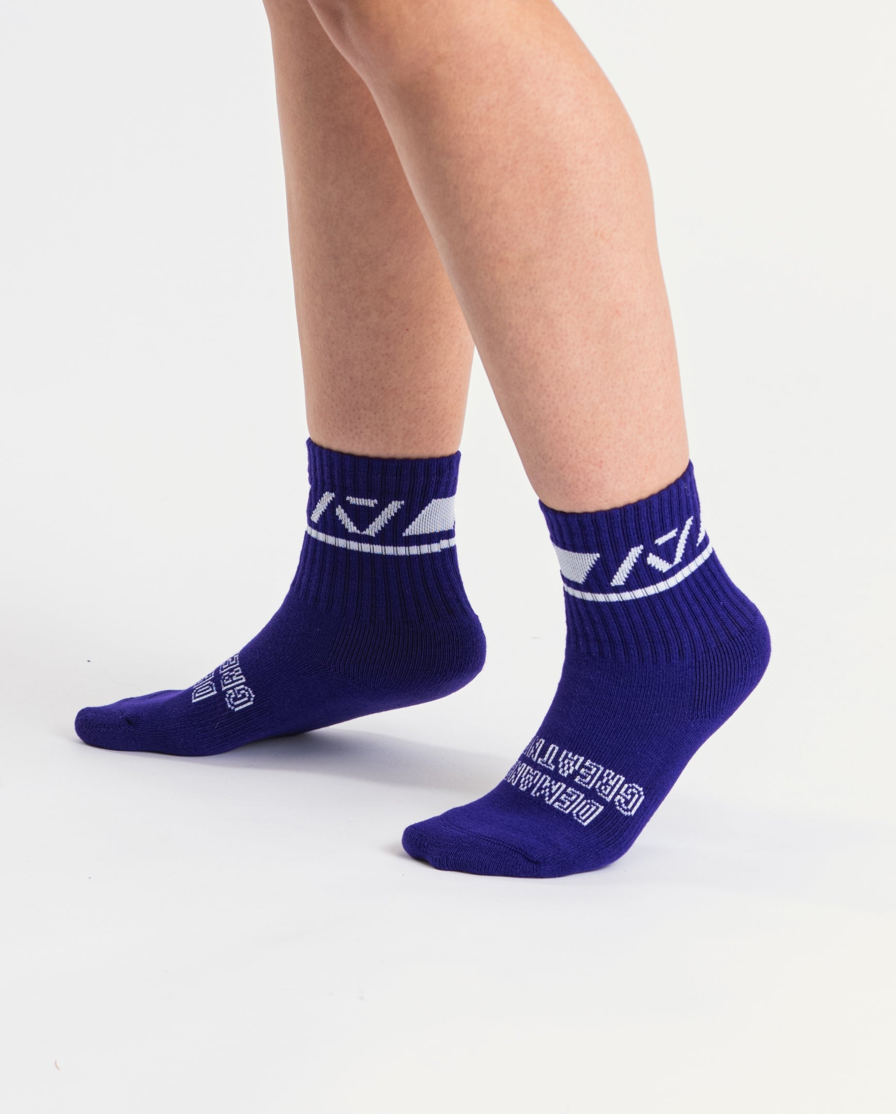 Side profile of A7 Crew Socks in Purple, highlighting the A7 logo on the ankle and compression-style top.