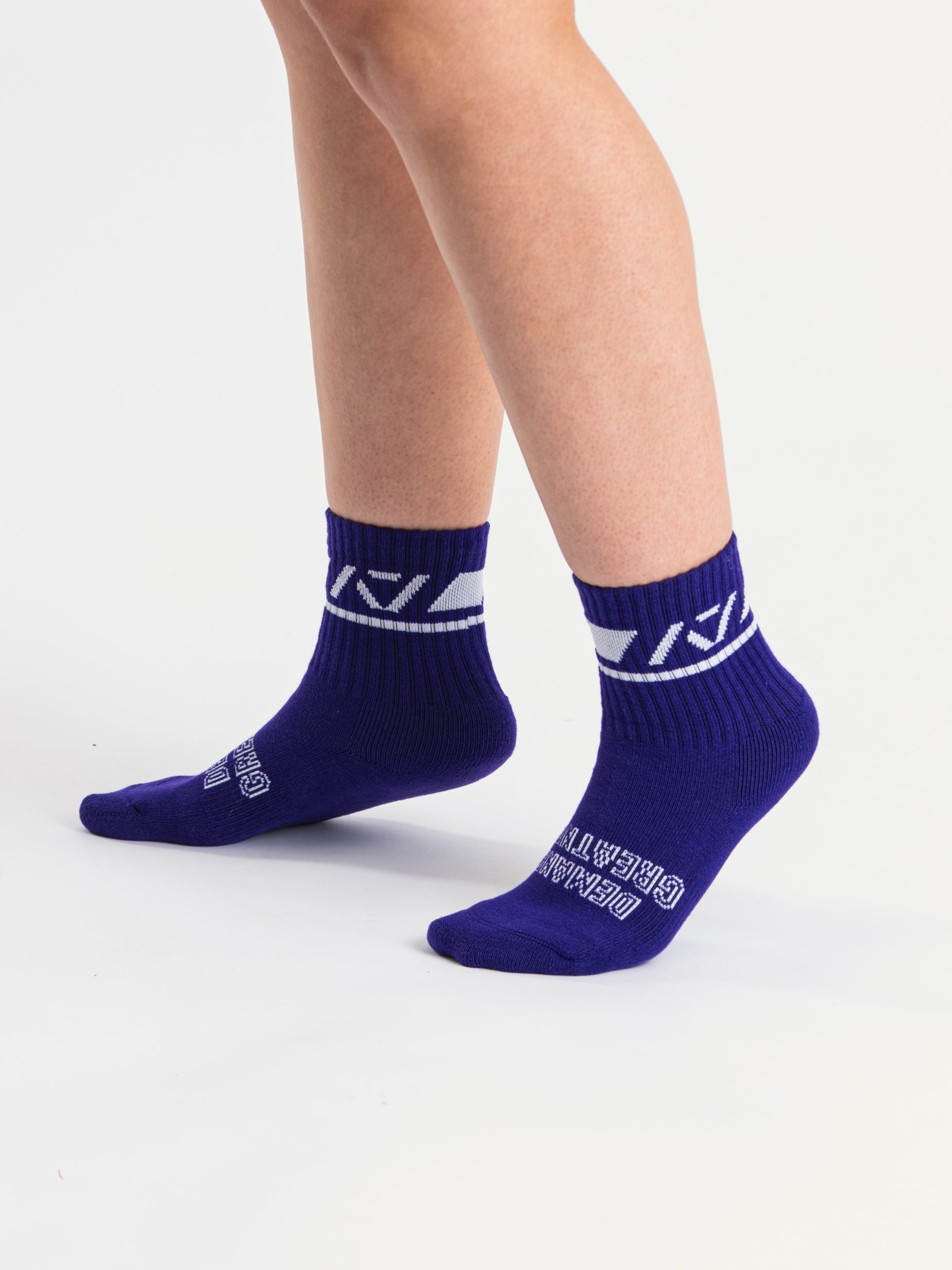 Side profile of A7 Crew Socks in Purple, highlighting the A7 logo on the ankle and compression-style top.