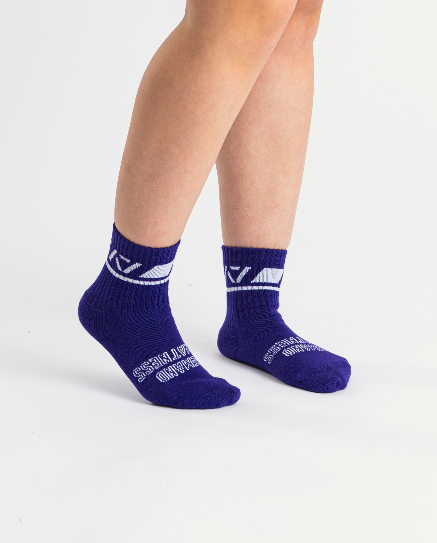 Side profile of A7 Crew Socks in Purple, highlighting the A7 logo on the ankle and compression-style top.