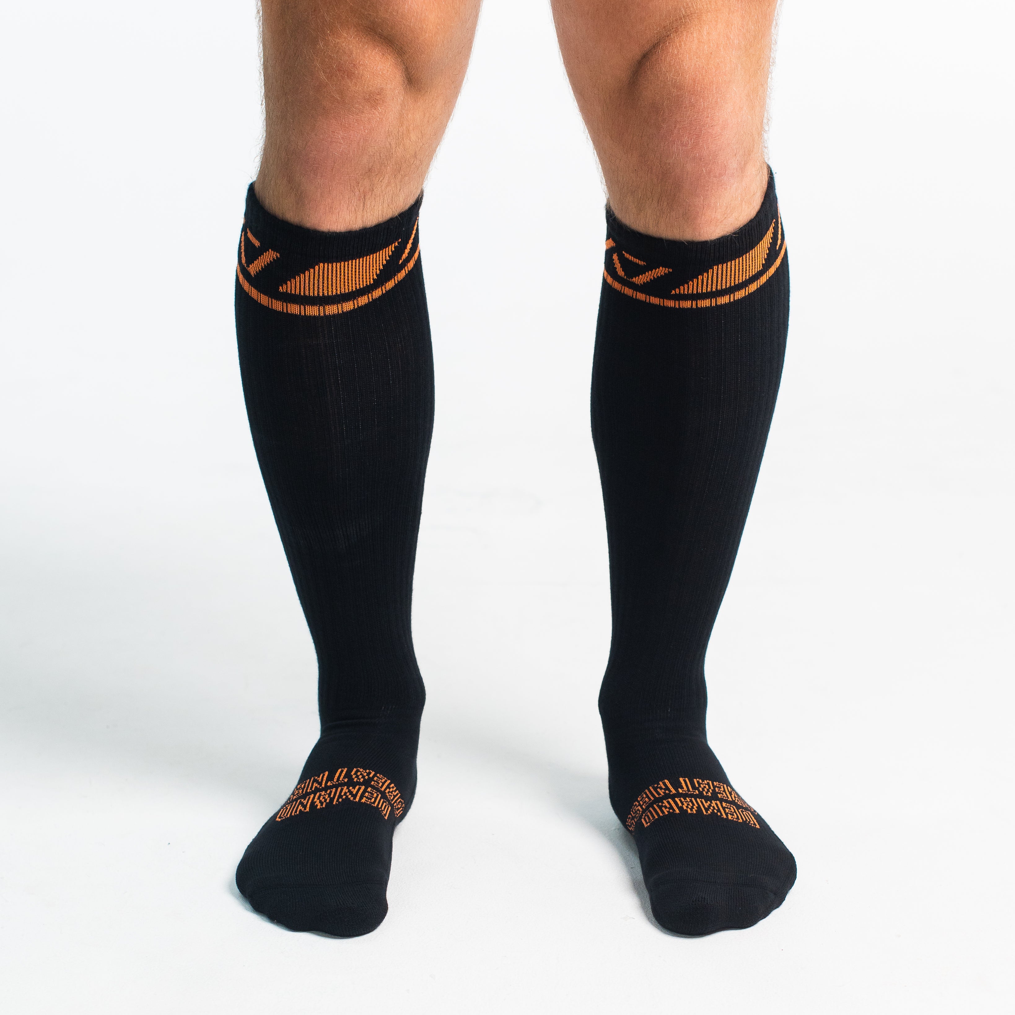 Front view of A7 Deadlift Socks in Blaze, showcasing mid-shin length and ribbed cuff design