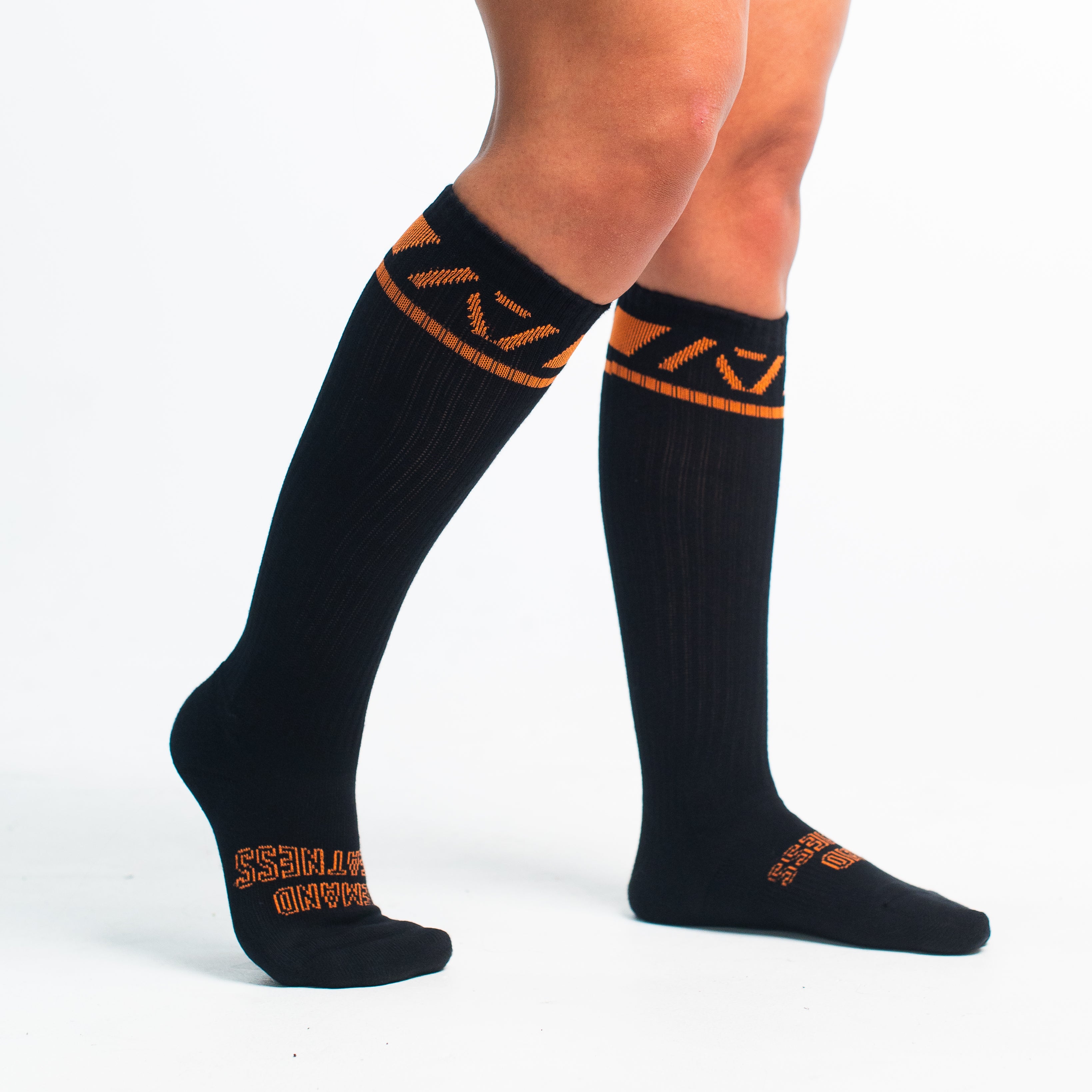Side profile of A7 Deadlift Socks in Blaze, highlighting the A7 logo on the ankle and compression-style top.