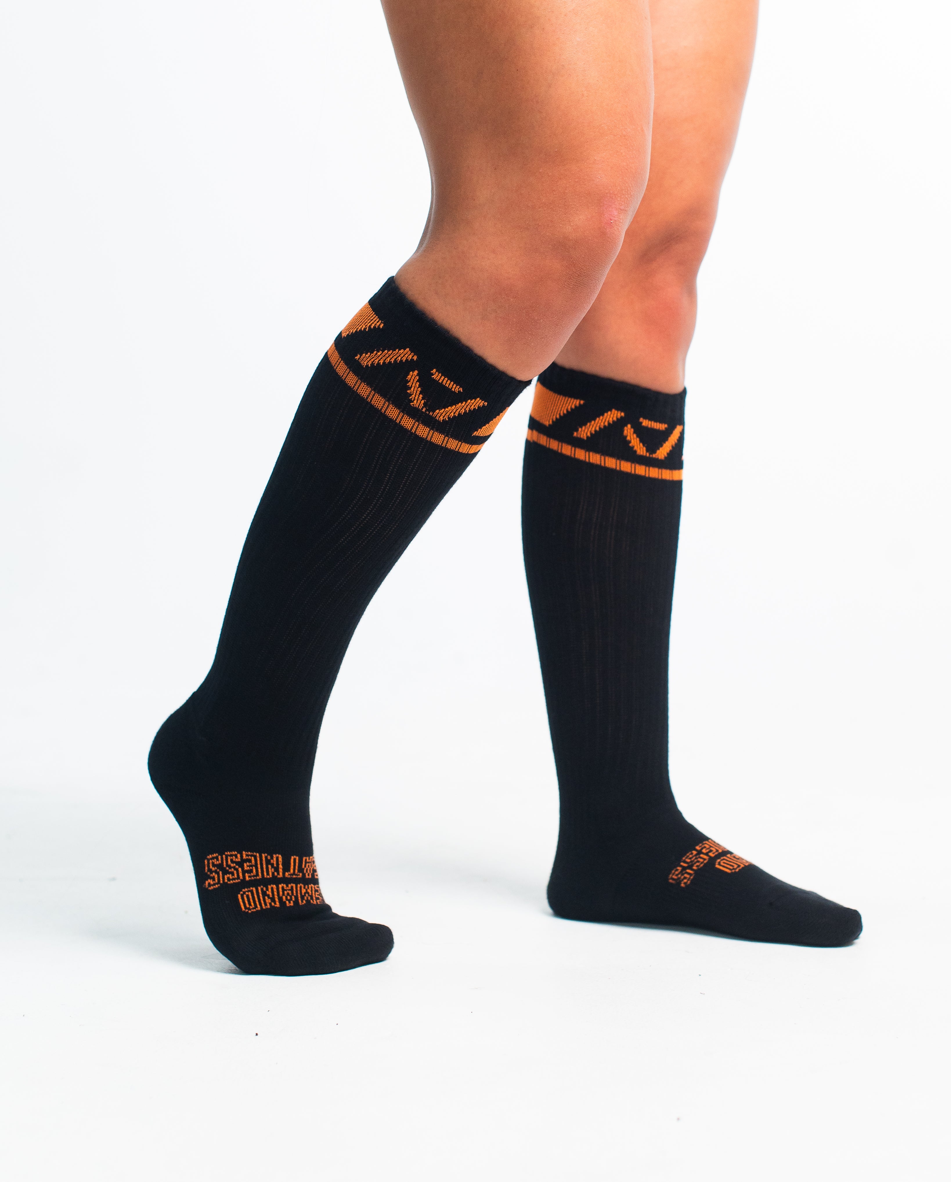 Side profile of A7 Deadlift Socks in Blaze, highlighting the A7 logo on the ankle and compression-style top.