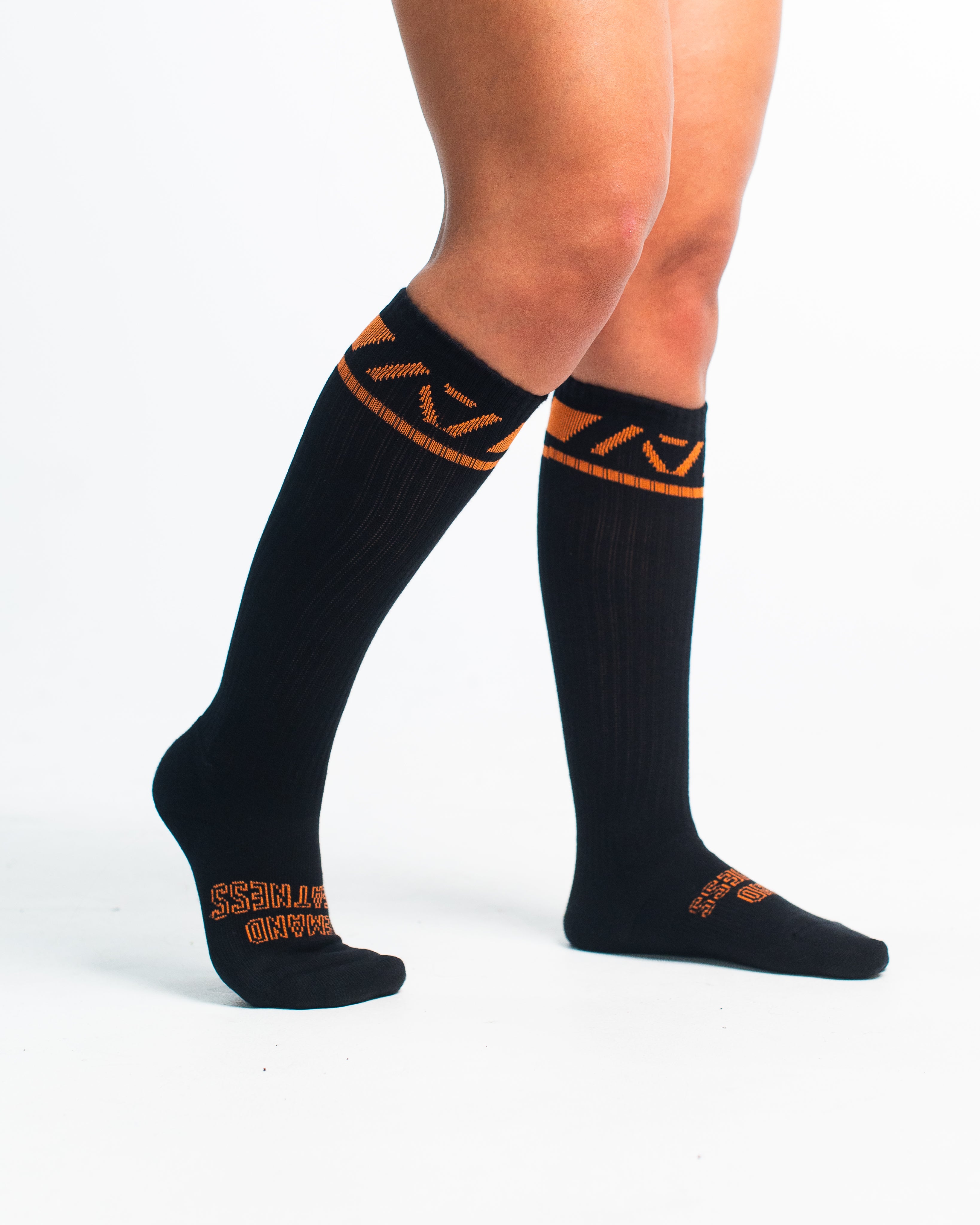 Side profile of A7 Deadlift Socks in Blaze, highlighting the A7 logo on the ankle and compression-style top.