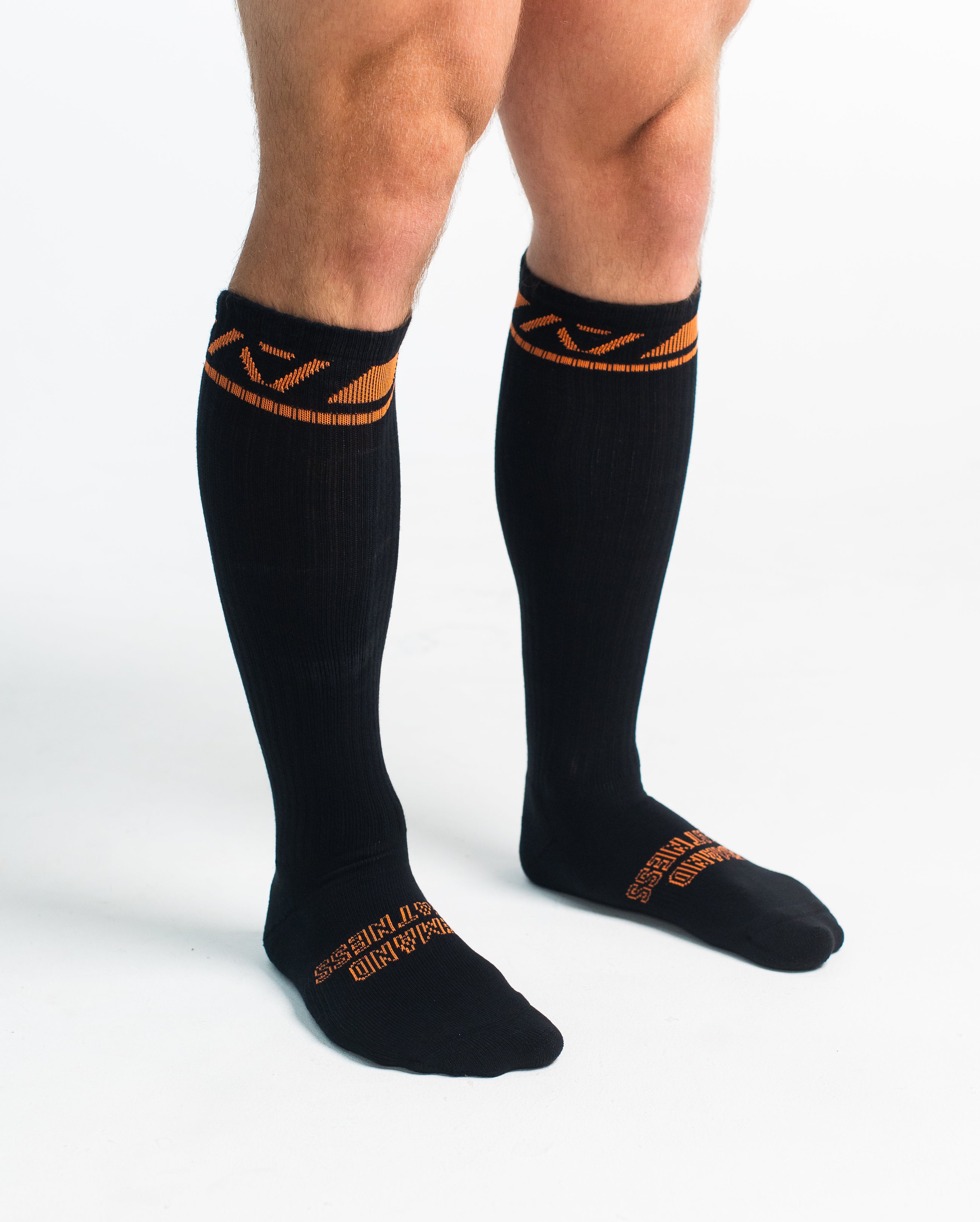 Side profile of A7 Deadlift Socks in Blaze, highlighting the A7 logo on the ankle and compression-style top.