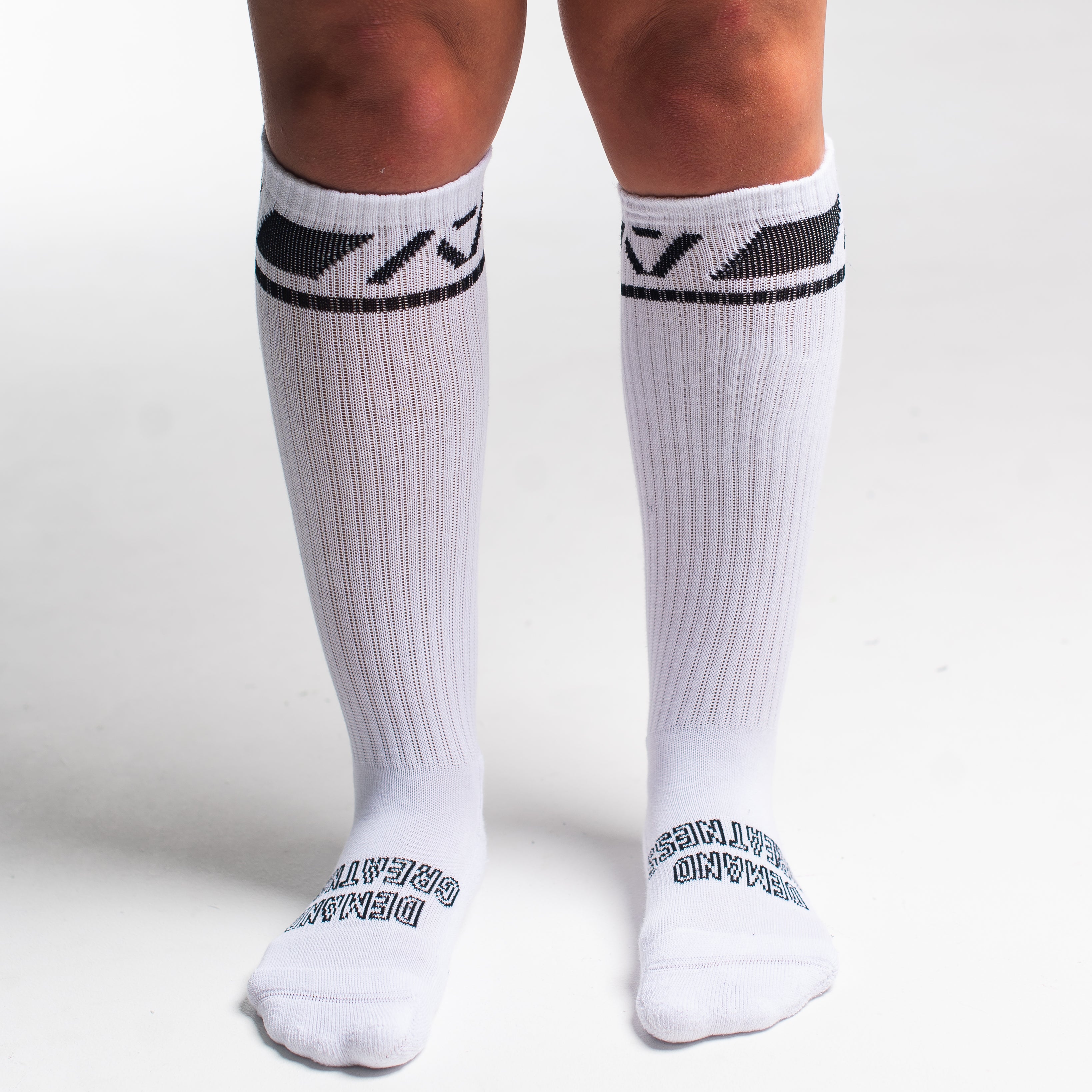 Front view of A7 Deadlift Socks in Domino White, showcasing knee-high length and ribbed cuff design.