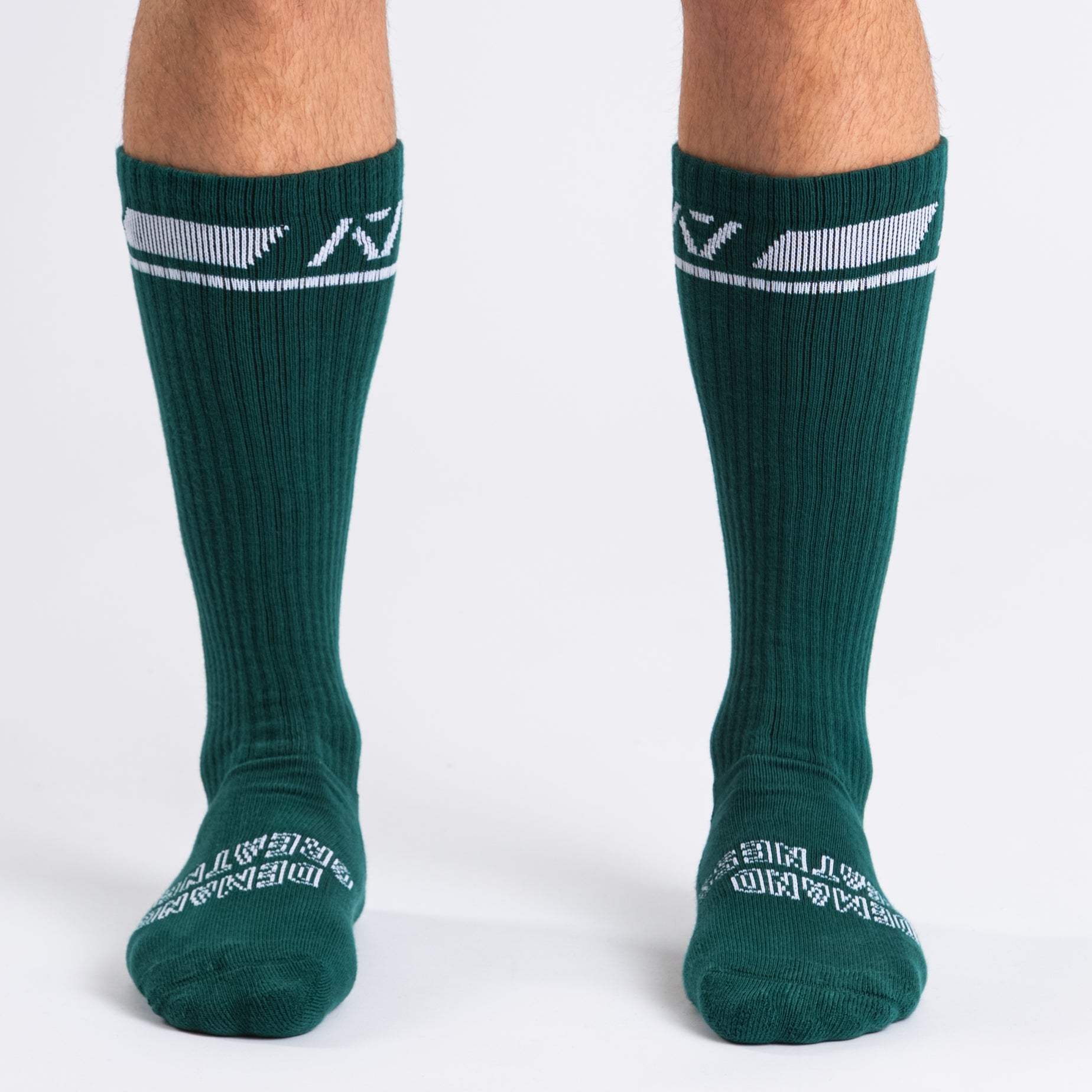 Front view of A7 Deadlift Socks in Emerald Forás, showcasing mid-shin length and ribbed cuff design.