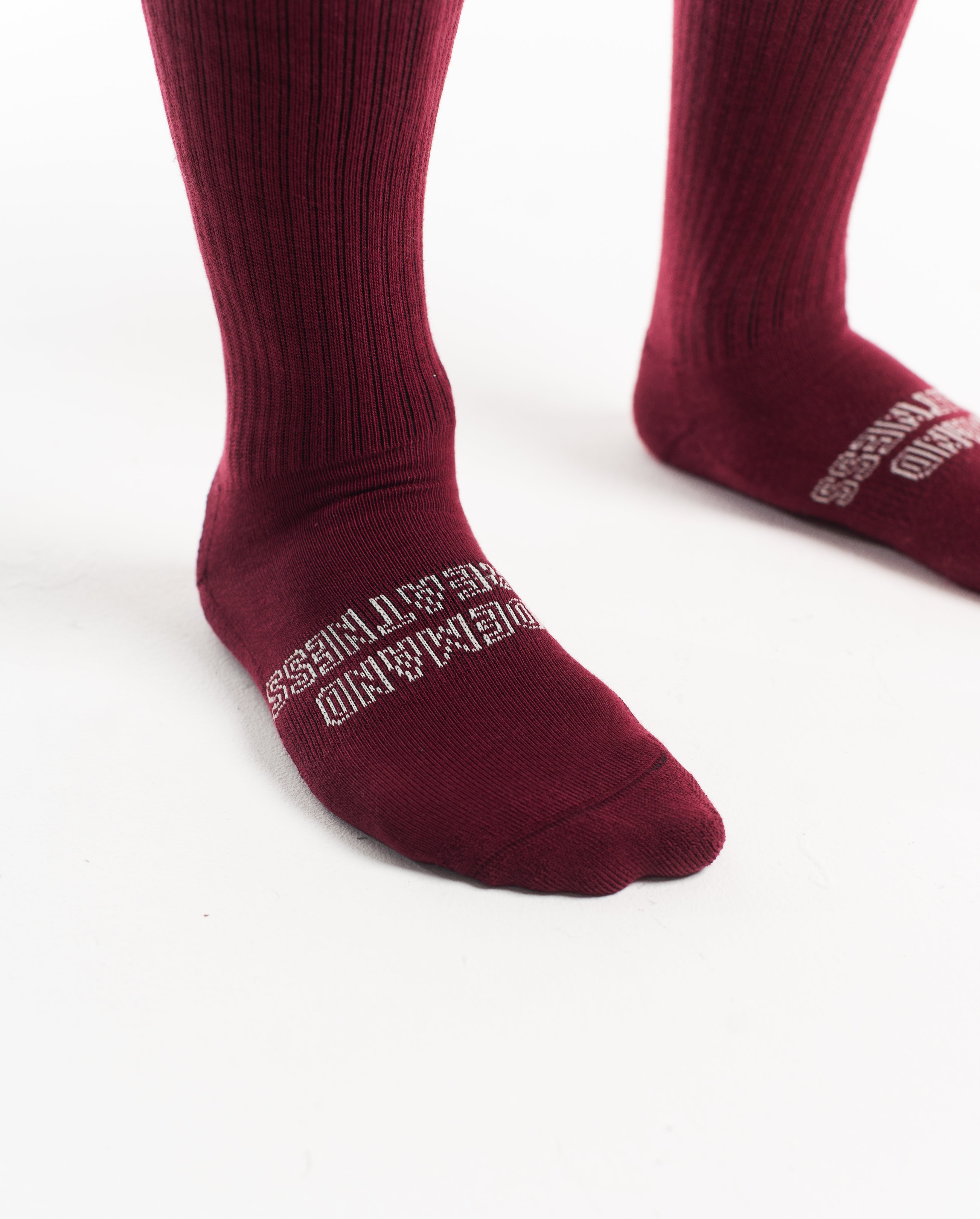 Close-up of the knit fabric on A7 Deadlift Socks in Ivory Rose, showing texture and stitching details.