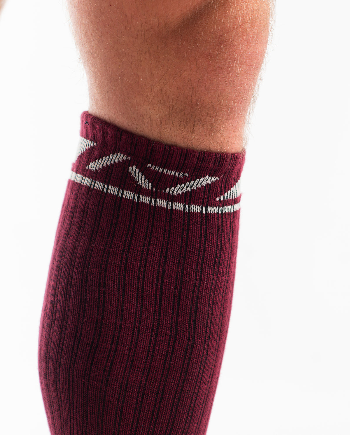 Close-up of the knit fabric on A7 Deadlift Socks in Ivory Rose, showing texture and stitching details.