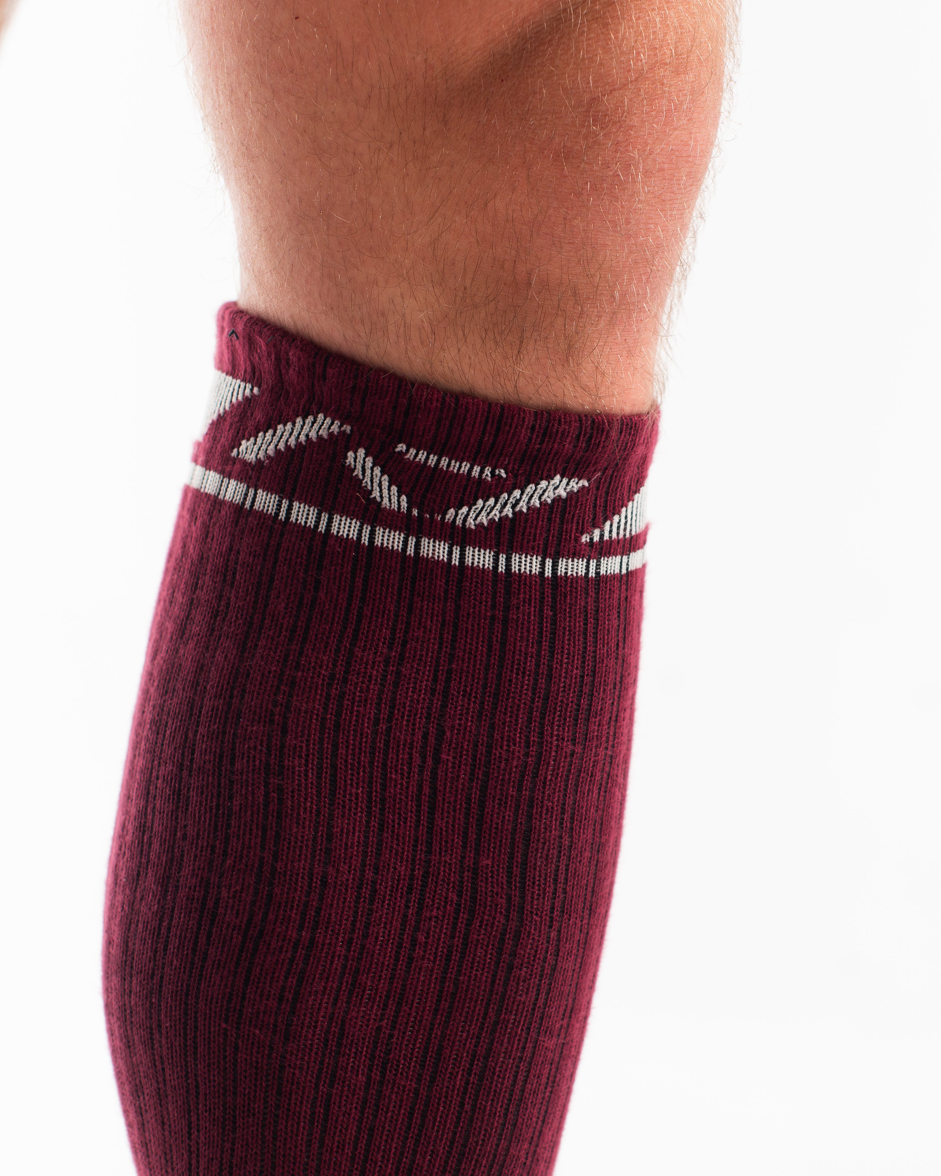 Close-up of the knit fabric on A7 Deadlift Socks in Ivory Rose, showing texture and stitching details.