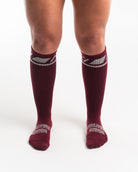 Front view of A7 Deadlift Socks in Ivory Rose, showcasing mid-shin length and ribbed cuff design.