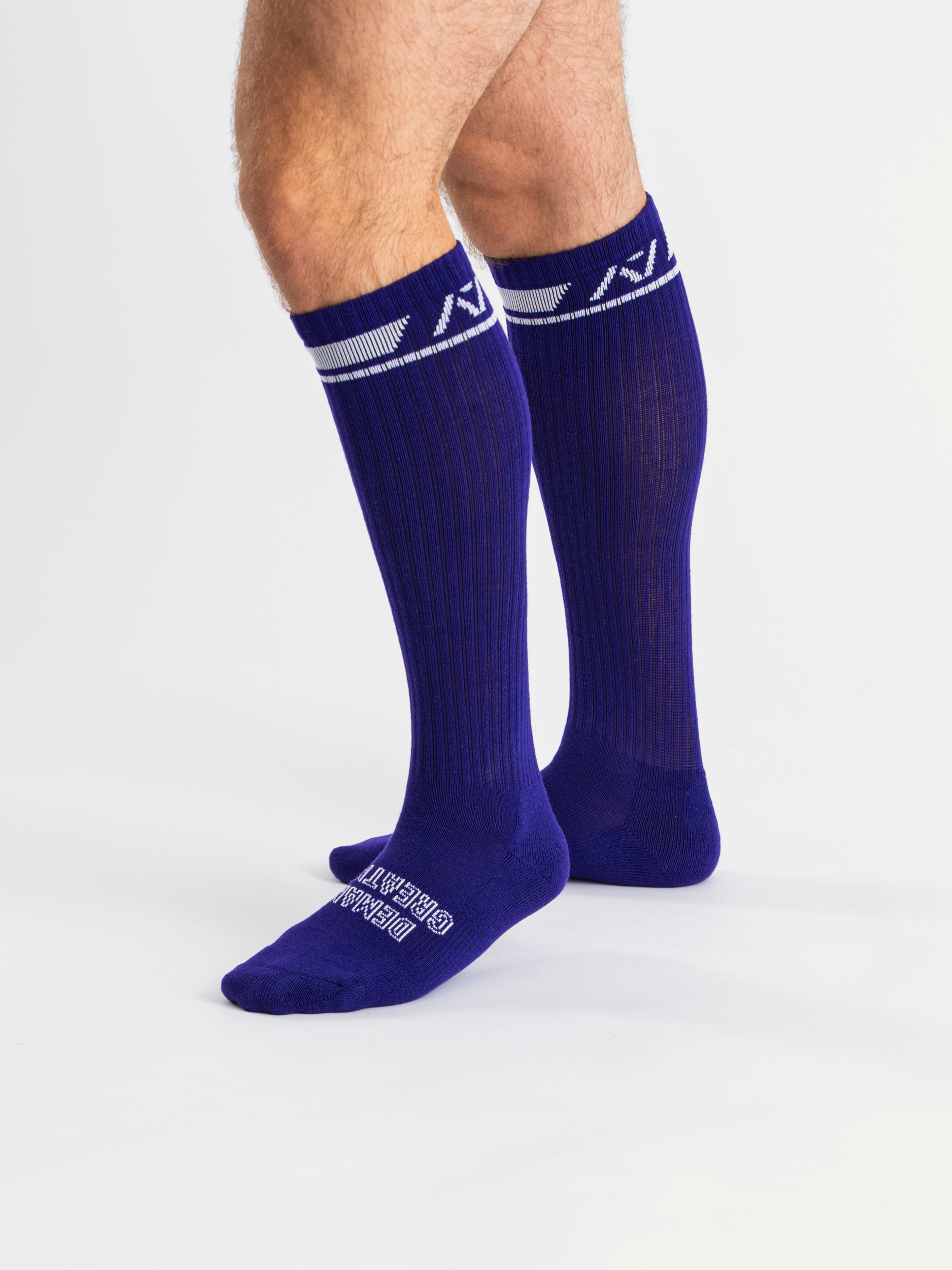 Side profile of A7 Deadlift Socks in purple, highlighting the A7 ankle logo and supportive compression fit.