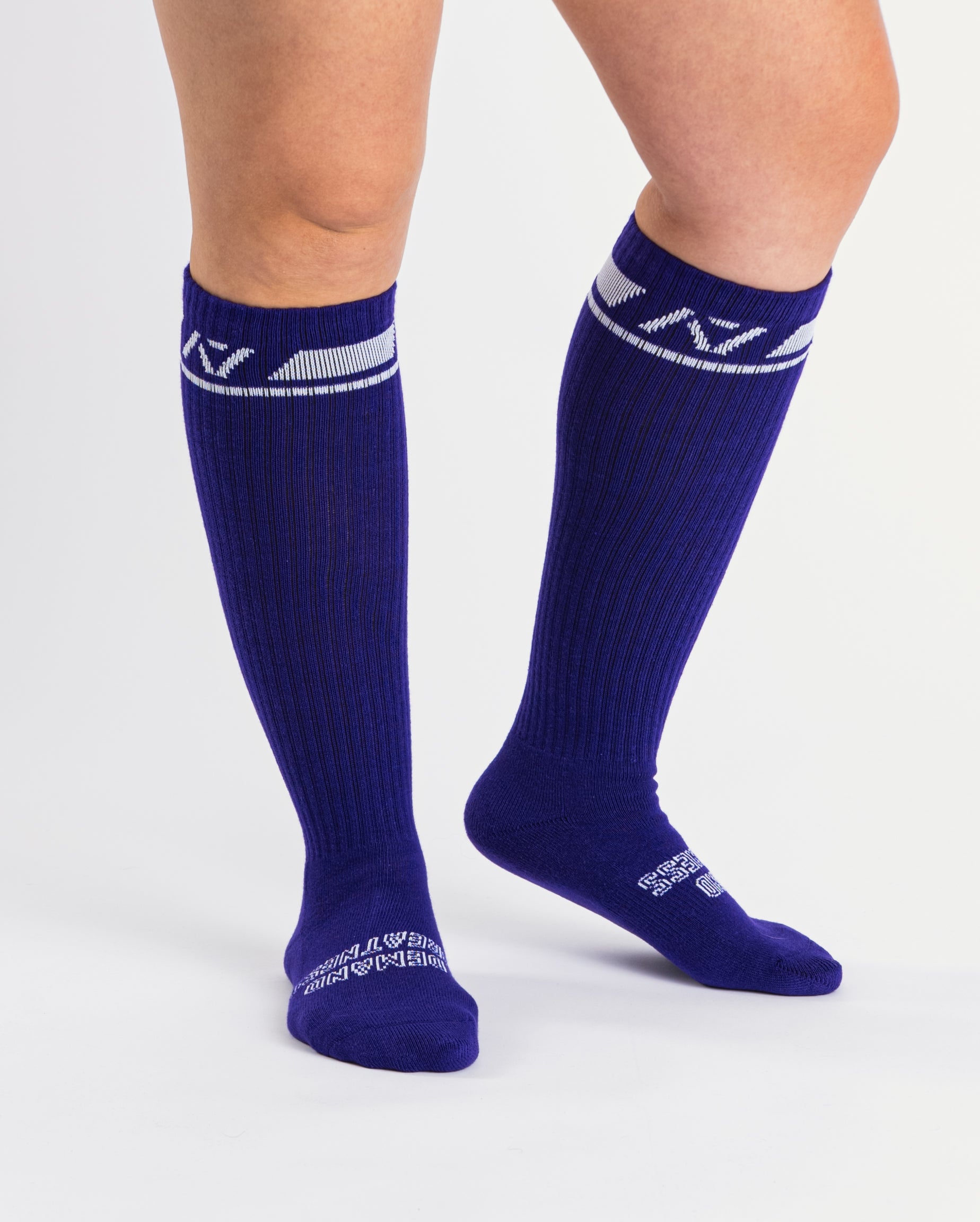 Side profile of A7 Deadlift Socks in purple, highlighting the A7 ankle logo and supportive compression fit.