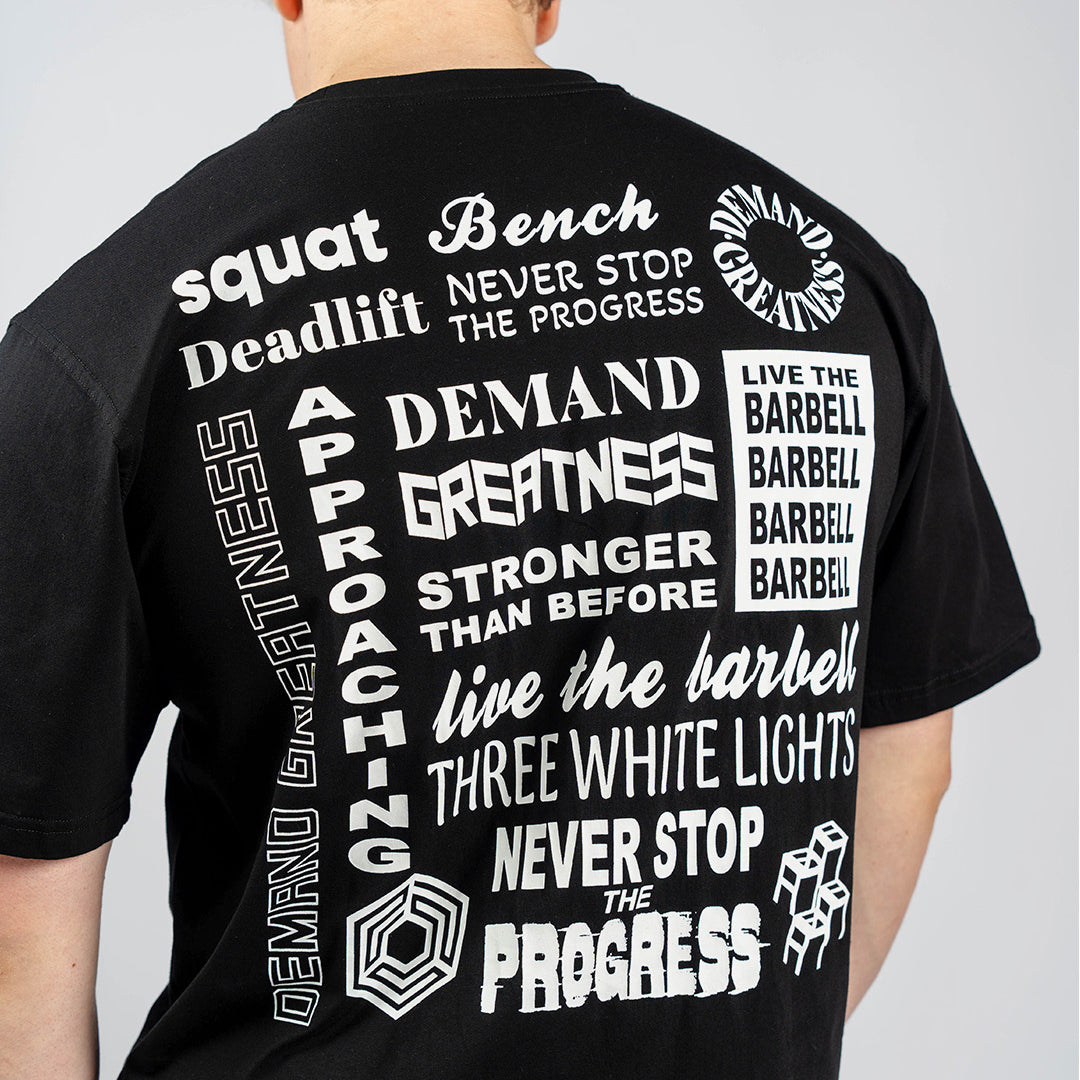 Back view of A7 Affirmation Over-Fit Shirt in Domino colorway showing drop shoulder and relaxed silhouette.