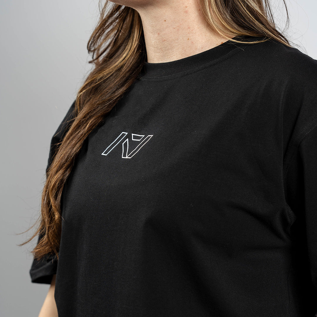 Close-up of white A7 logo on the Domino over-fit shirt showing sharp contrast print and clean branding.
