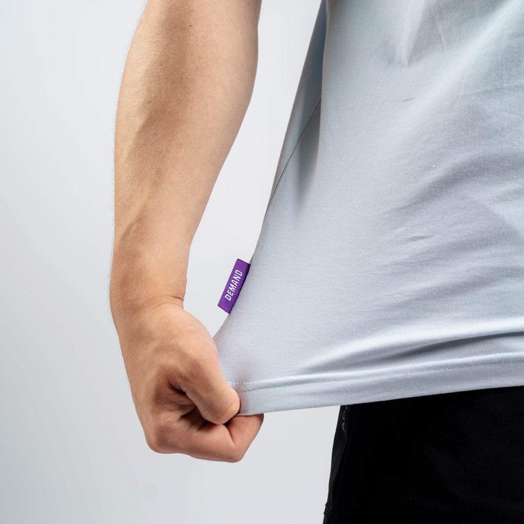 Close-up of the hem tag on the A7 Over-Fit Shirt – Pastel.