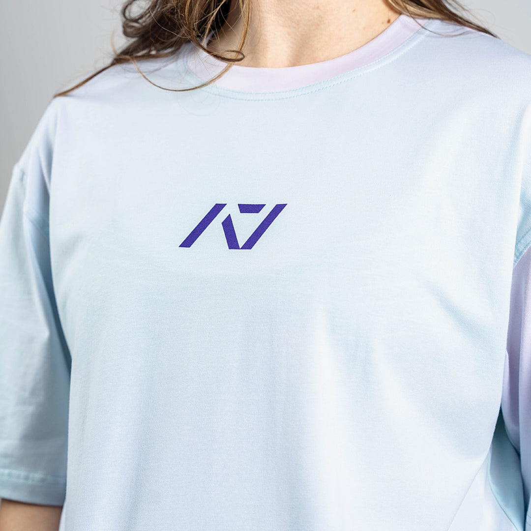 Tonal A7 logo screen-printed on the Affirmation Over-Fit Shirt – Pastel for clean and subtle branding.