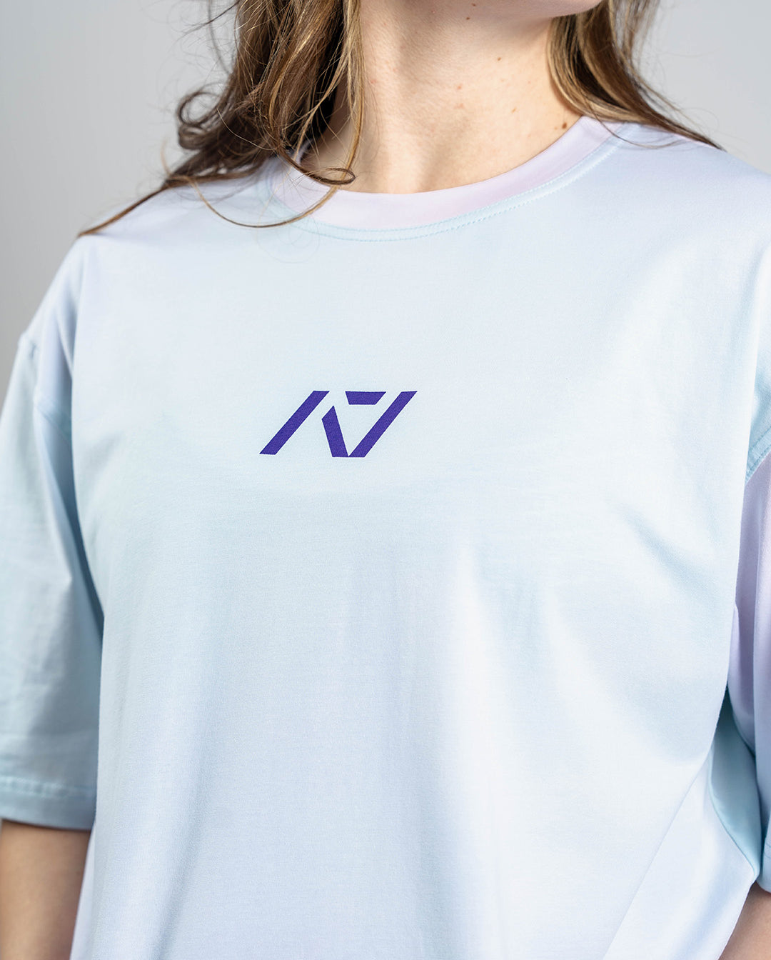 Tonal A7 logo screen-printed on the Affirmation Over-Fit Shirt – Pastel for clean and subtle branding.