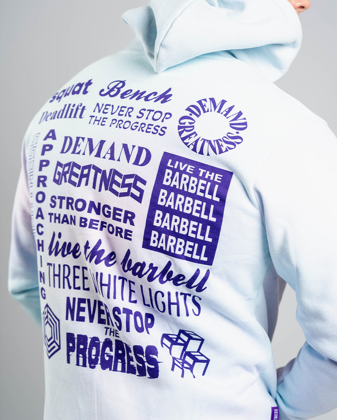 Back view of A7 Affirmation Zip Hoodie – Pastel showcasing motivational mantras in contrasting text on pastel fabric.