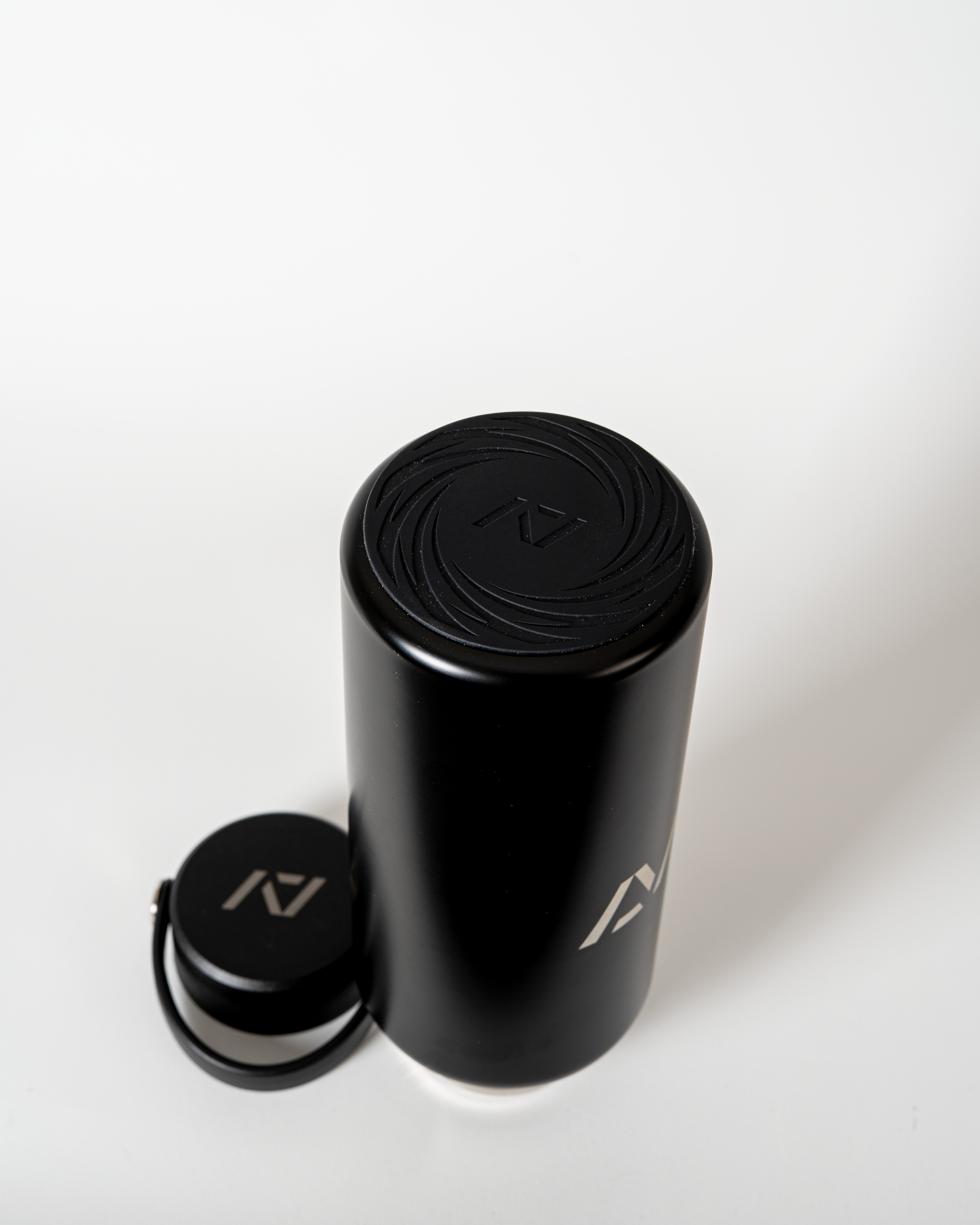 rubber base on 32oz black bottle