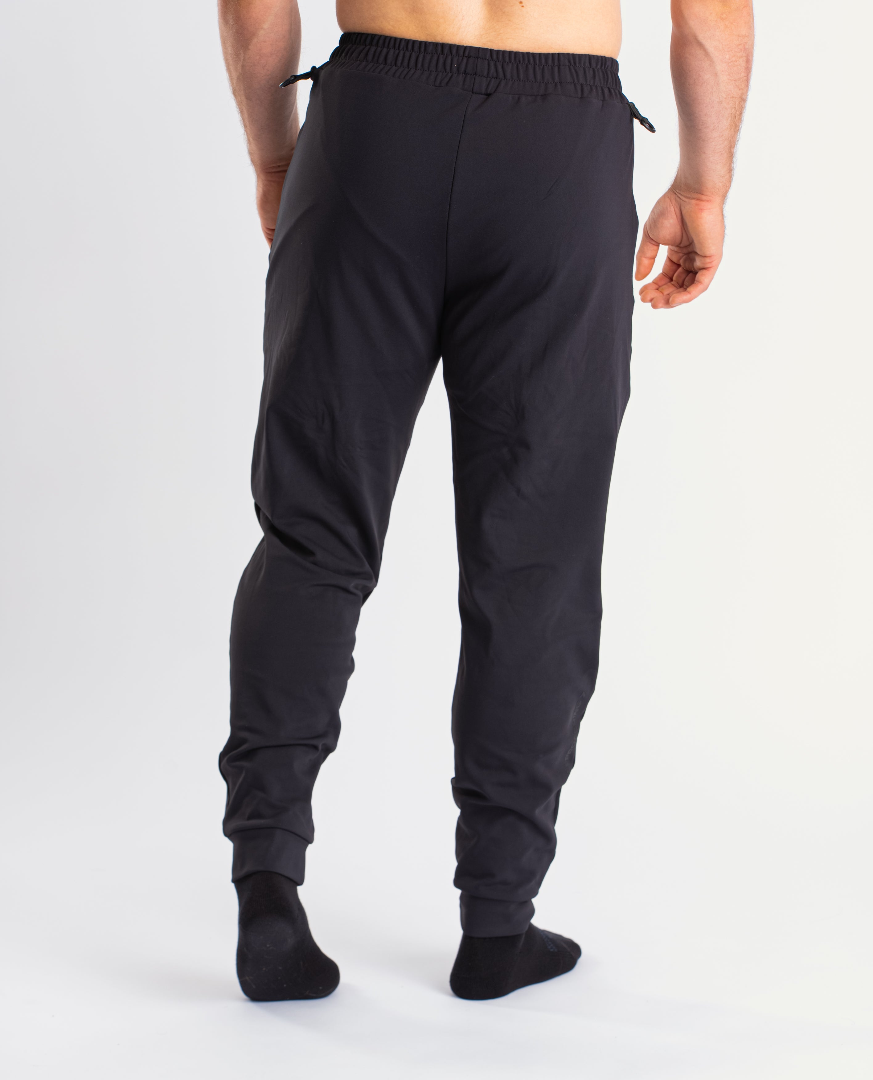Back view of A7 Cobra 360Go 1Z Joggers in Stealth, highlighting the elastic waistband and ankle cuffs.
