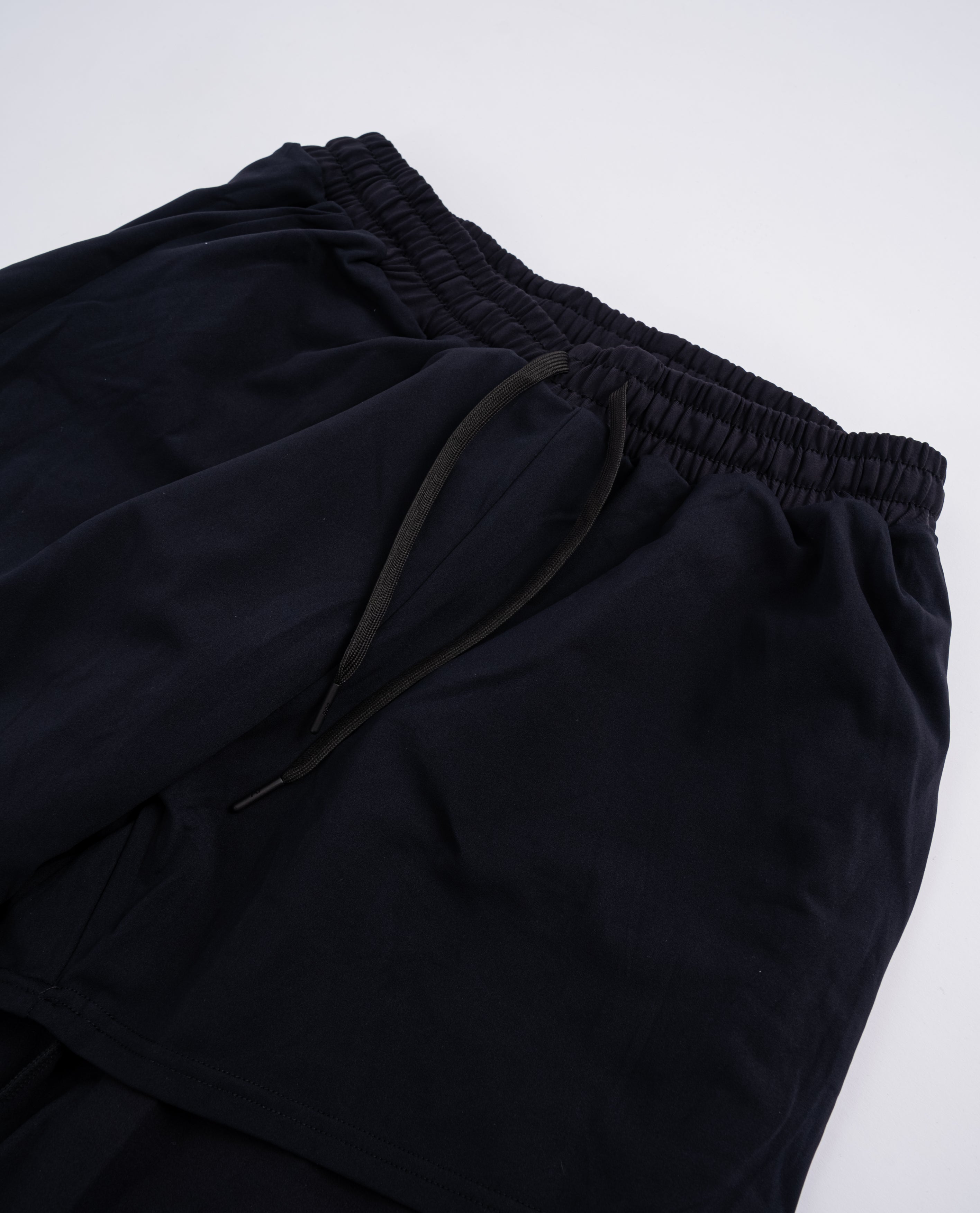 Detail of the hidden drawstrings with A7 aglets on the Cobra 360Go 1Z Joggers in Stealth.