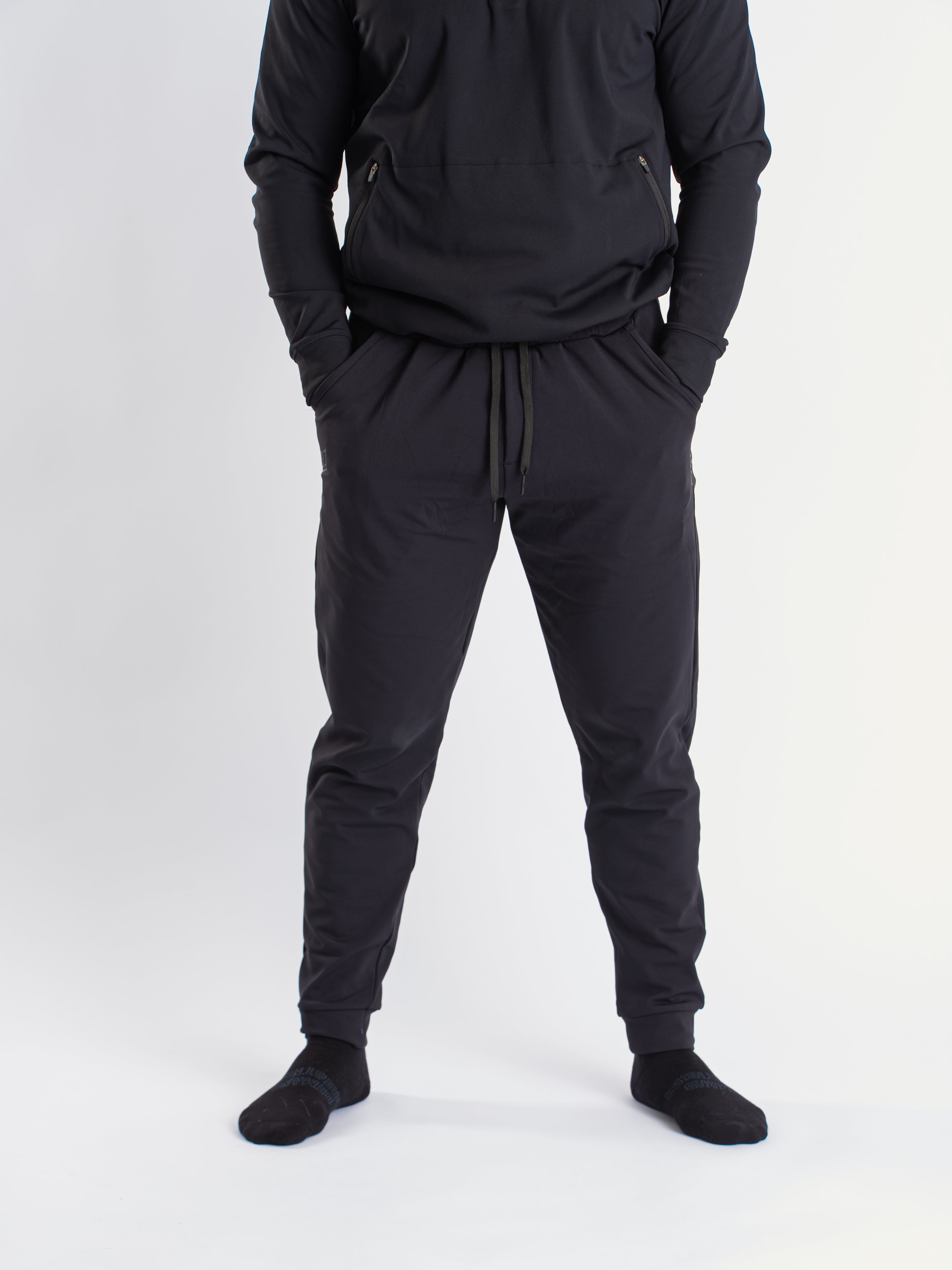 Front view of A7 Cobra 360Go 1Z Joggers in Stealth, showcasing the sleek design and tapered leg fit.