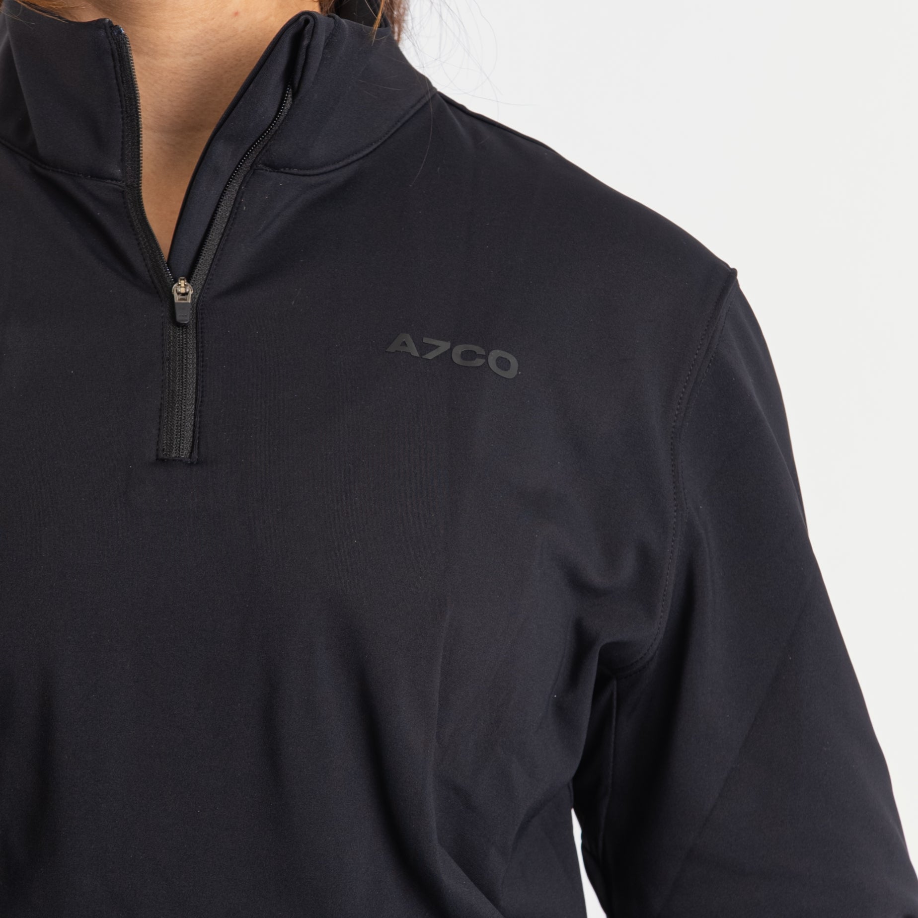 Close-up of the soft 4-way-stretch fabric of the A7 Cobra Quarter Zip Jacket in Stealth, emphasizing comfort and flexibility