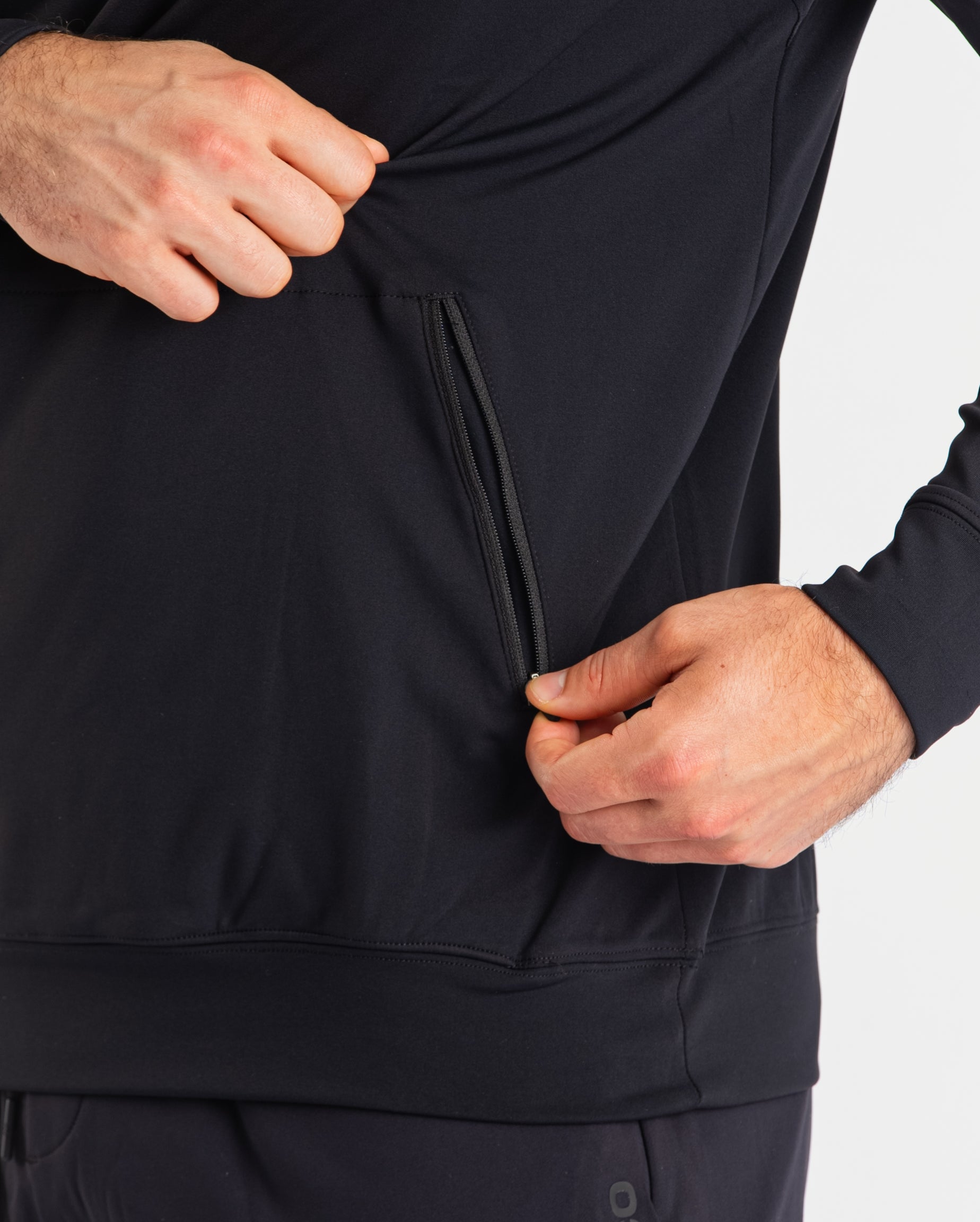 Close-up of the zippered pocket on the A7 Cobra Quarter Zip Jacket – Stealth, designed for secure storage with a clean, minimalist finish.