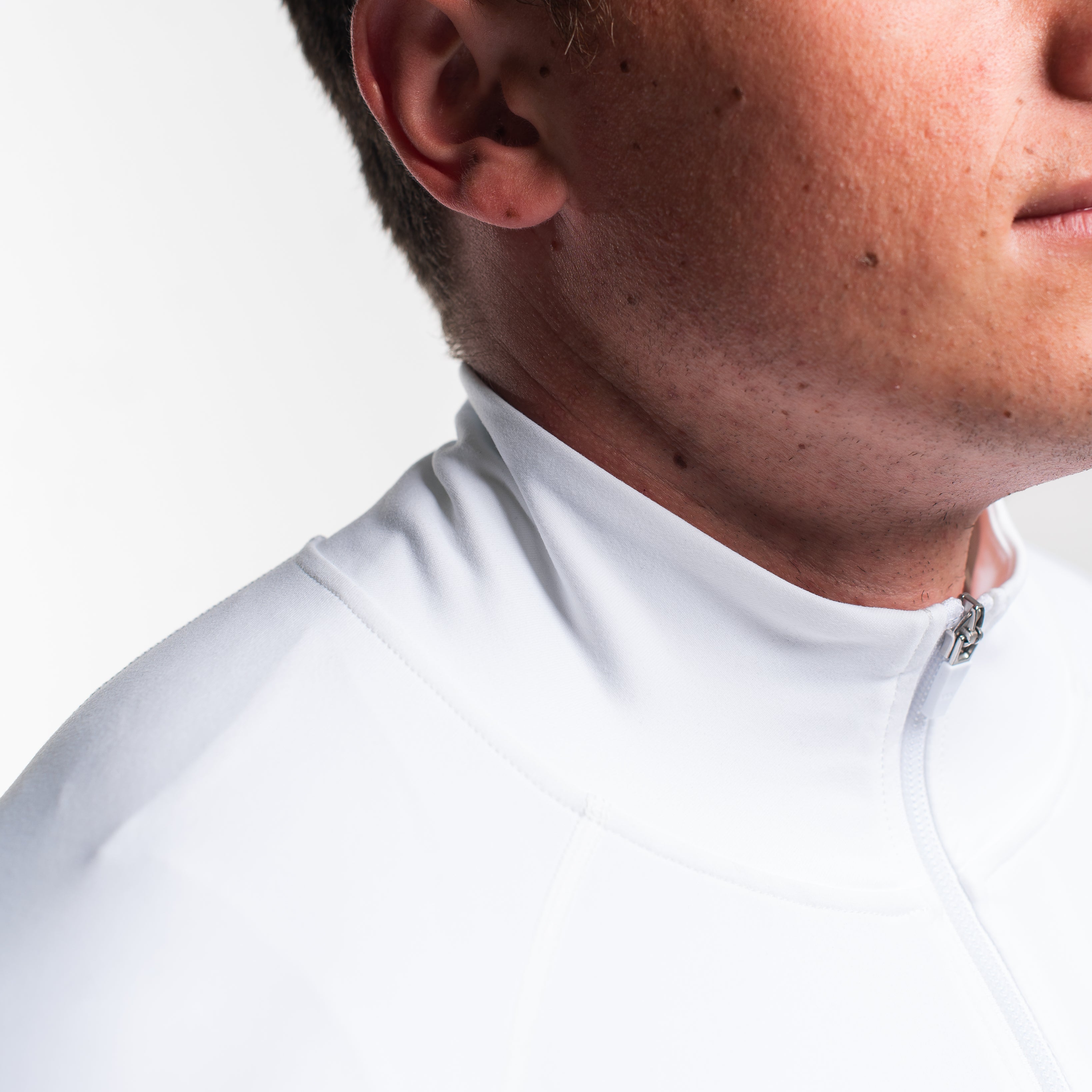 Close-up of 4‑way stretch knit fabric on the Polar Defy Jacket showing texture.