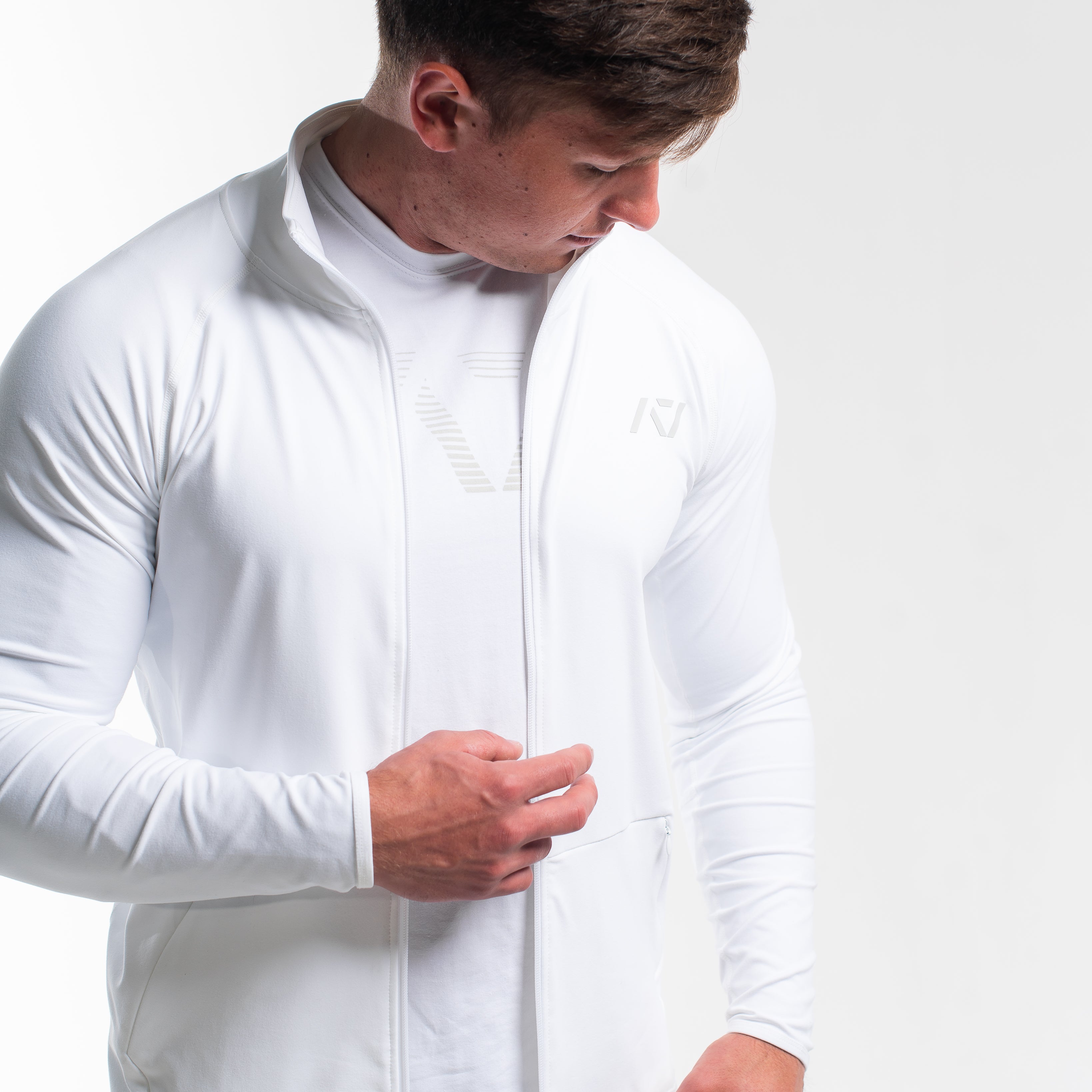 Close-up of 4‑way stretch knit fabric on the Polar Defy Jacket showing texture.