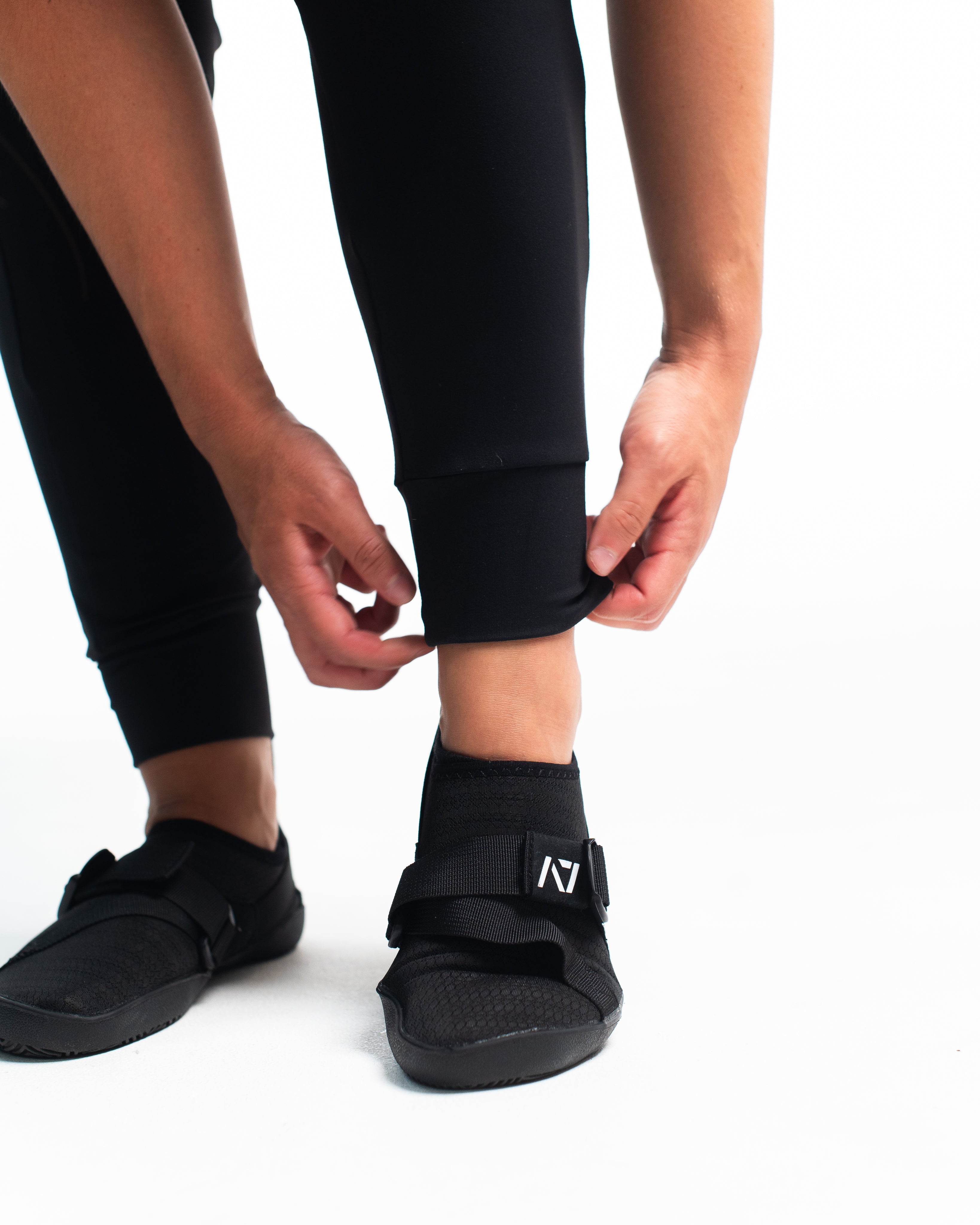 Close-up of elastic ankle cuff, showing stay-in-place stretch and neat taper.