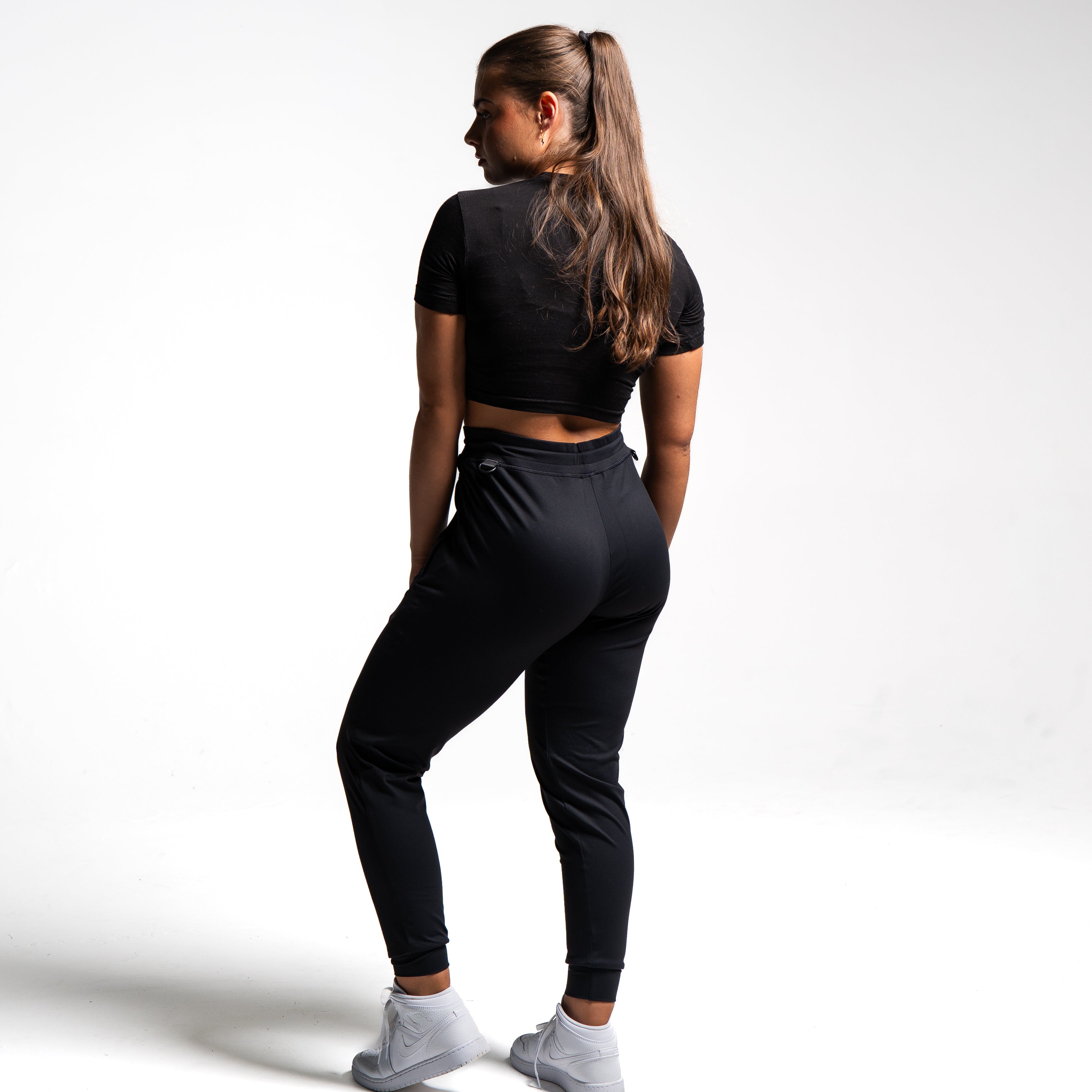Rear view of the USAPL Classic joggers showing clean silhouette with no back pockets.
