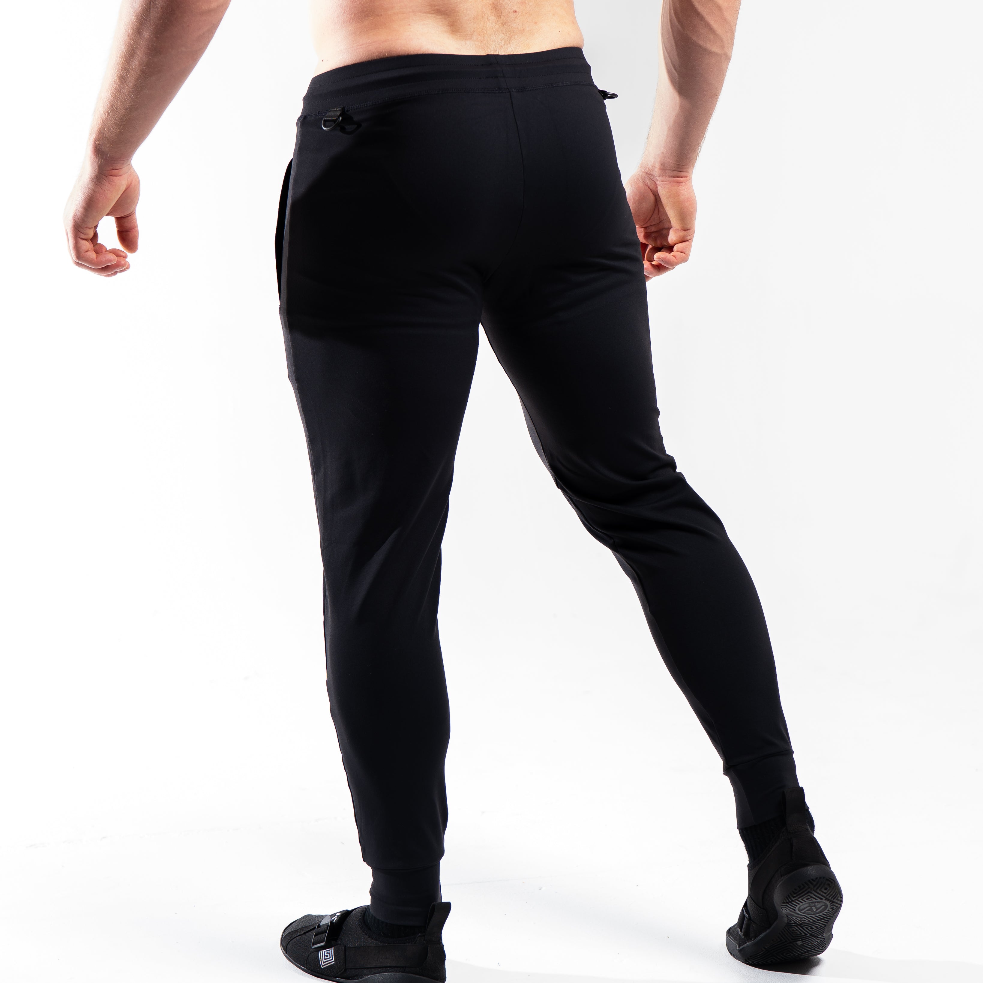 Rear view of the USAPL Classic joggers showing clean silhouette with no back pockets.