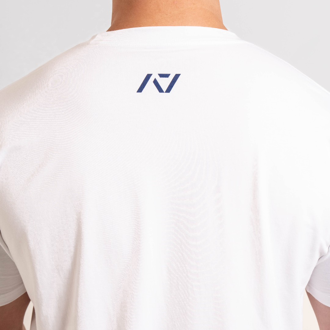 Close-up of the A7 logo printed on the upper back of the Americana True-Fit Meet Shirt, centered just below the neckline.