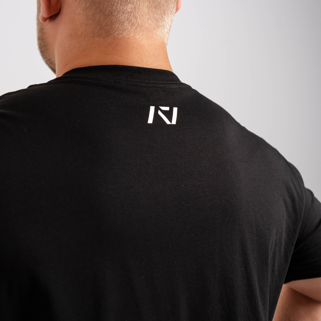 Back view highlighting A7 logo printed below the neckline on the Domino shirt.